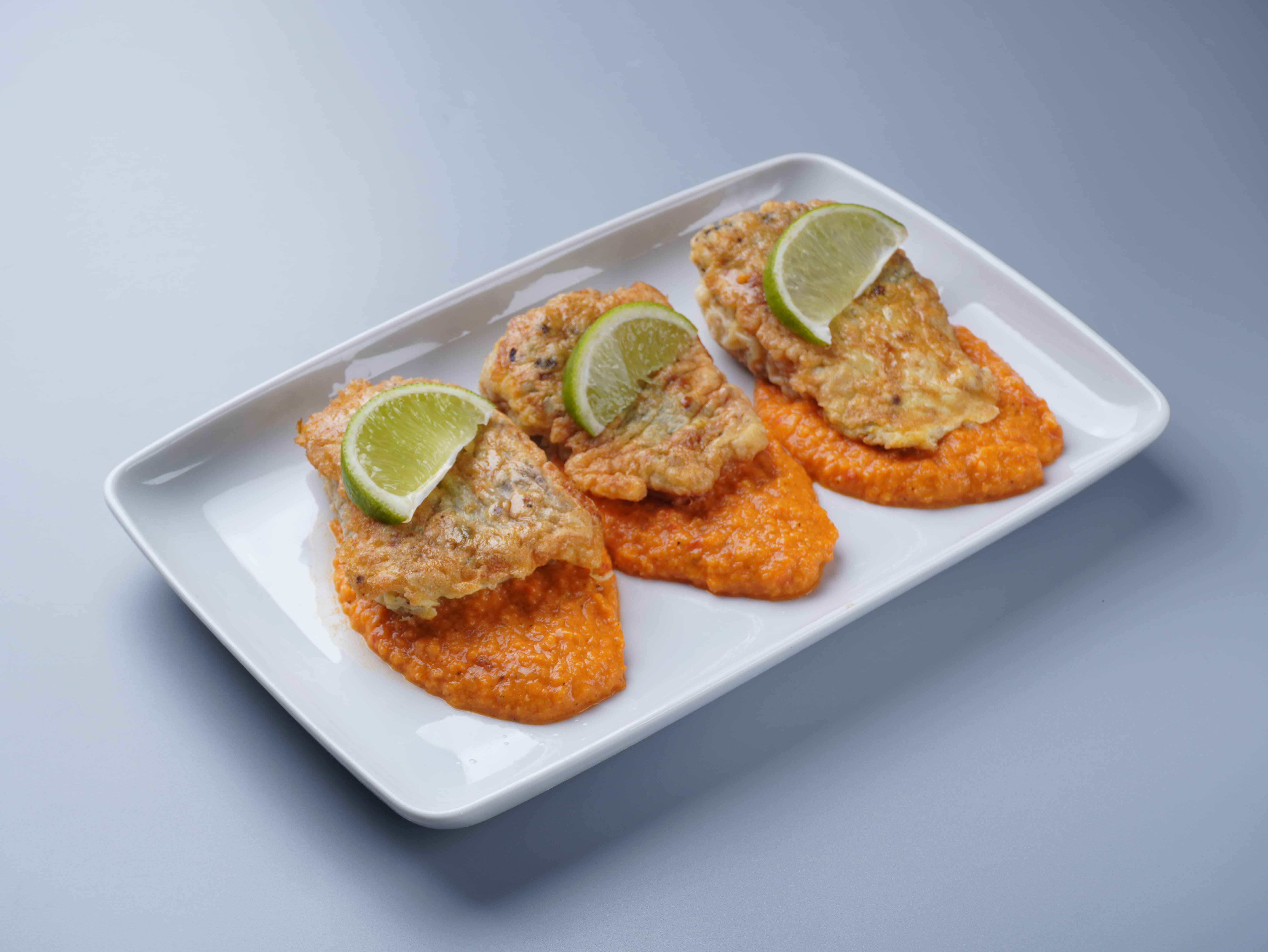 Філе хека на овочевій подушці з лаймом ( 100 грам)