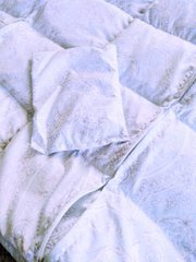 Отяжена сенсорна ковдра