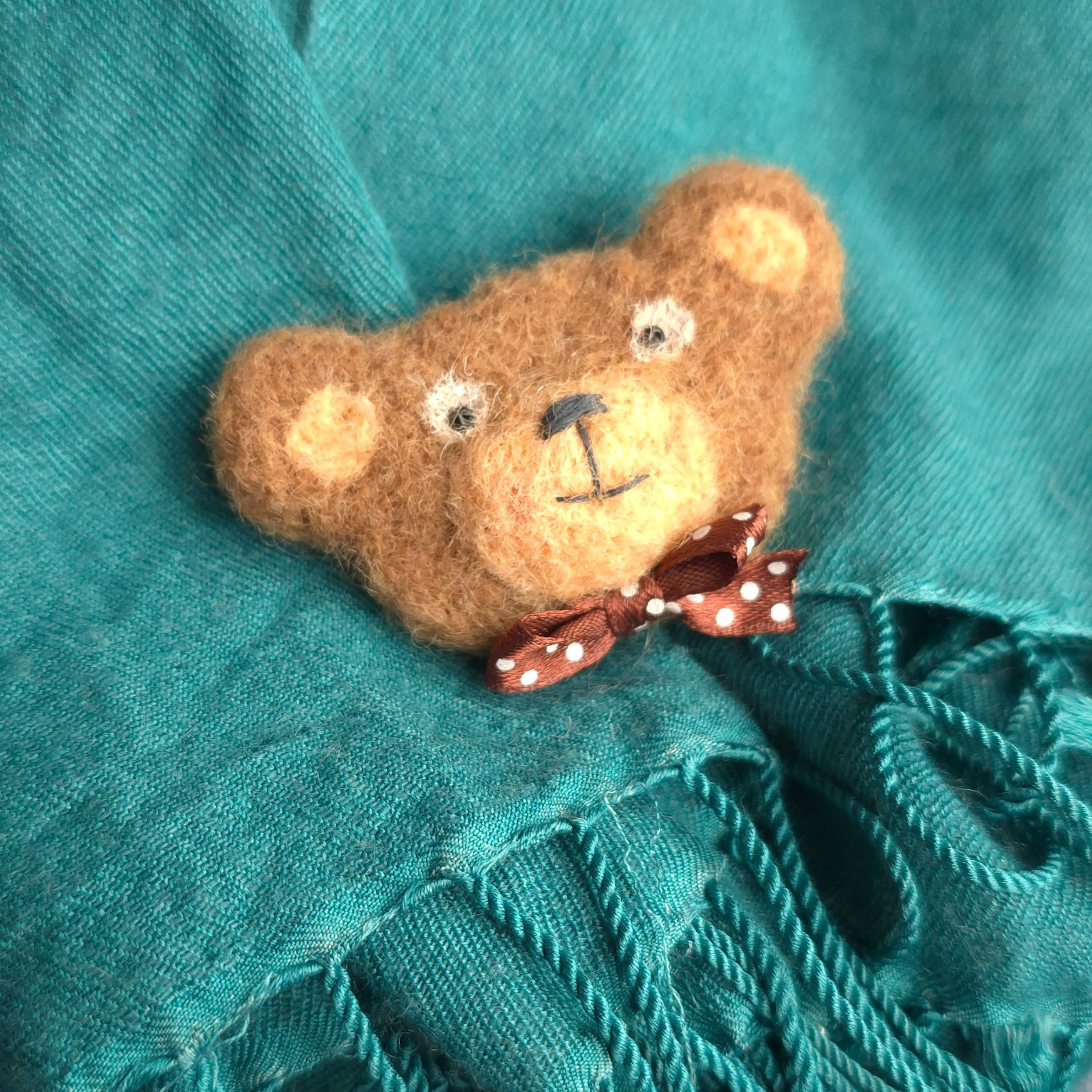 Felted brooch Teddy bear head with braun bow tie