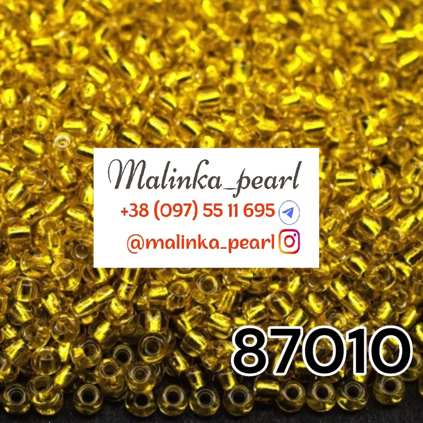 Бісер жовтий, прозорий з блискучим срібним отвором