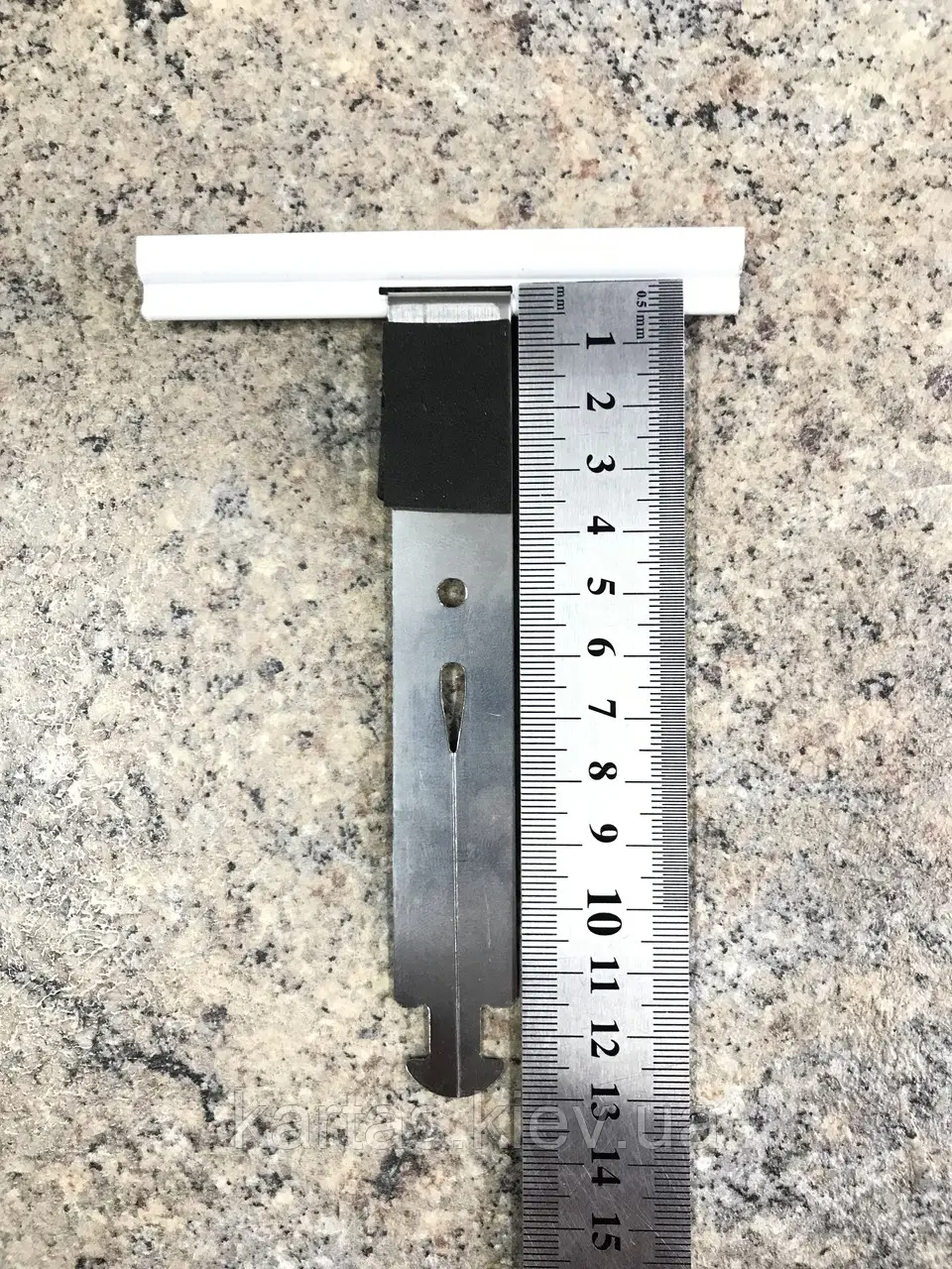 Тримач ламелі