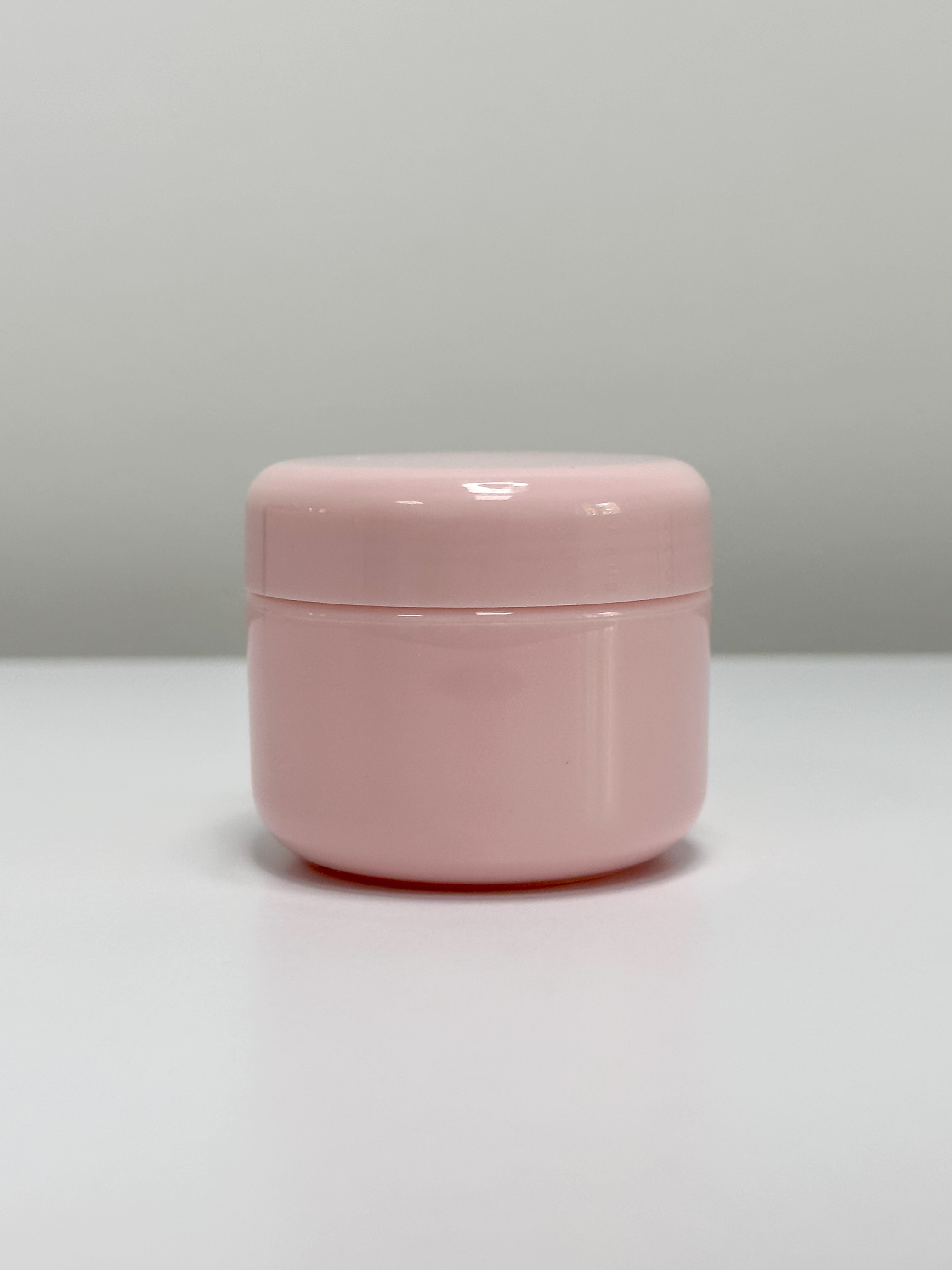 Баночка косметична 50 мл пластикова рожева