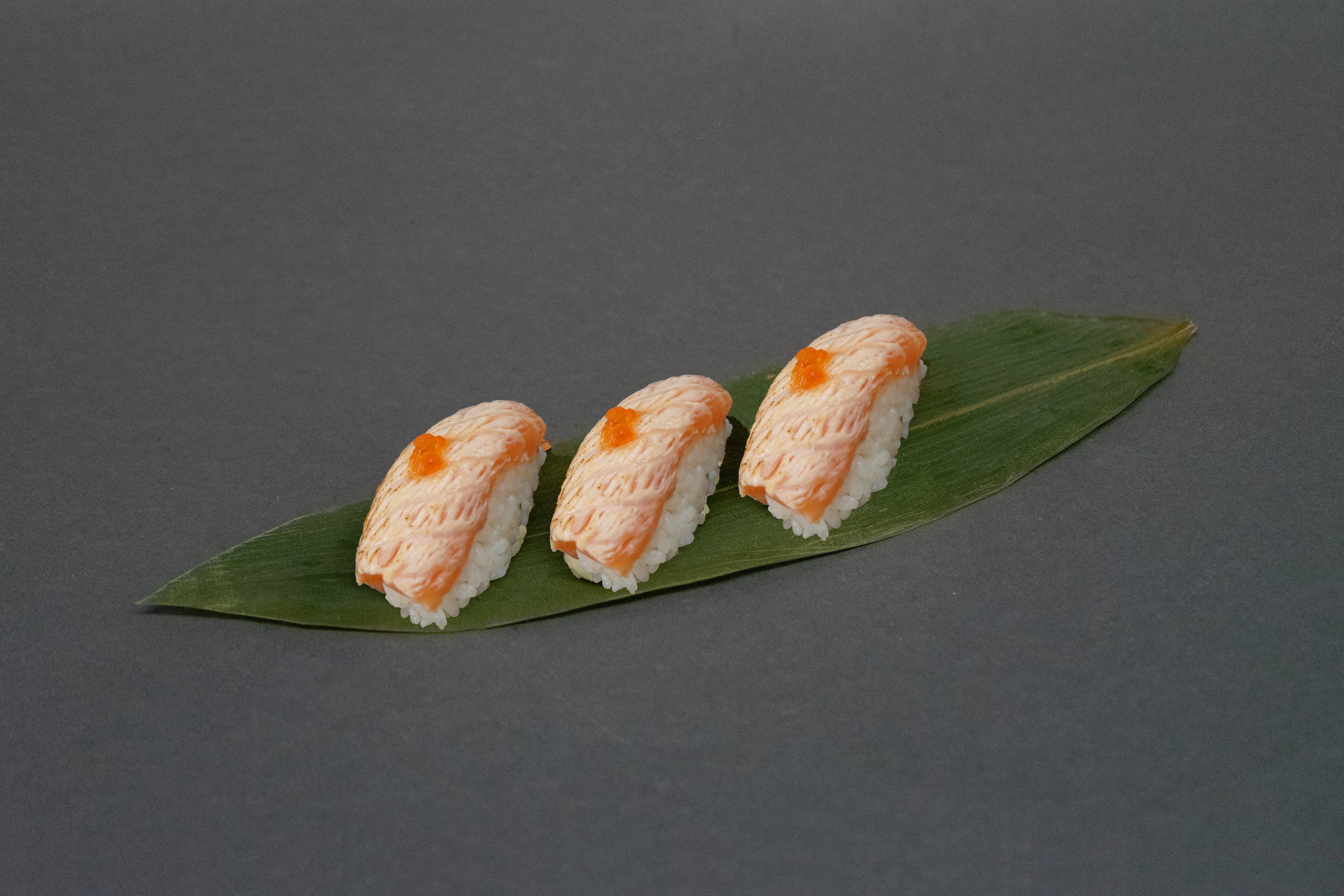 Baked salmon nigiri