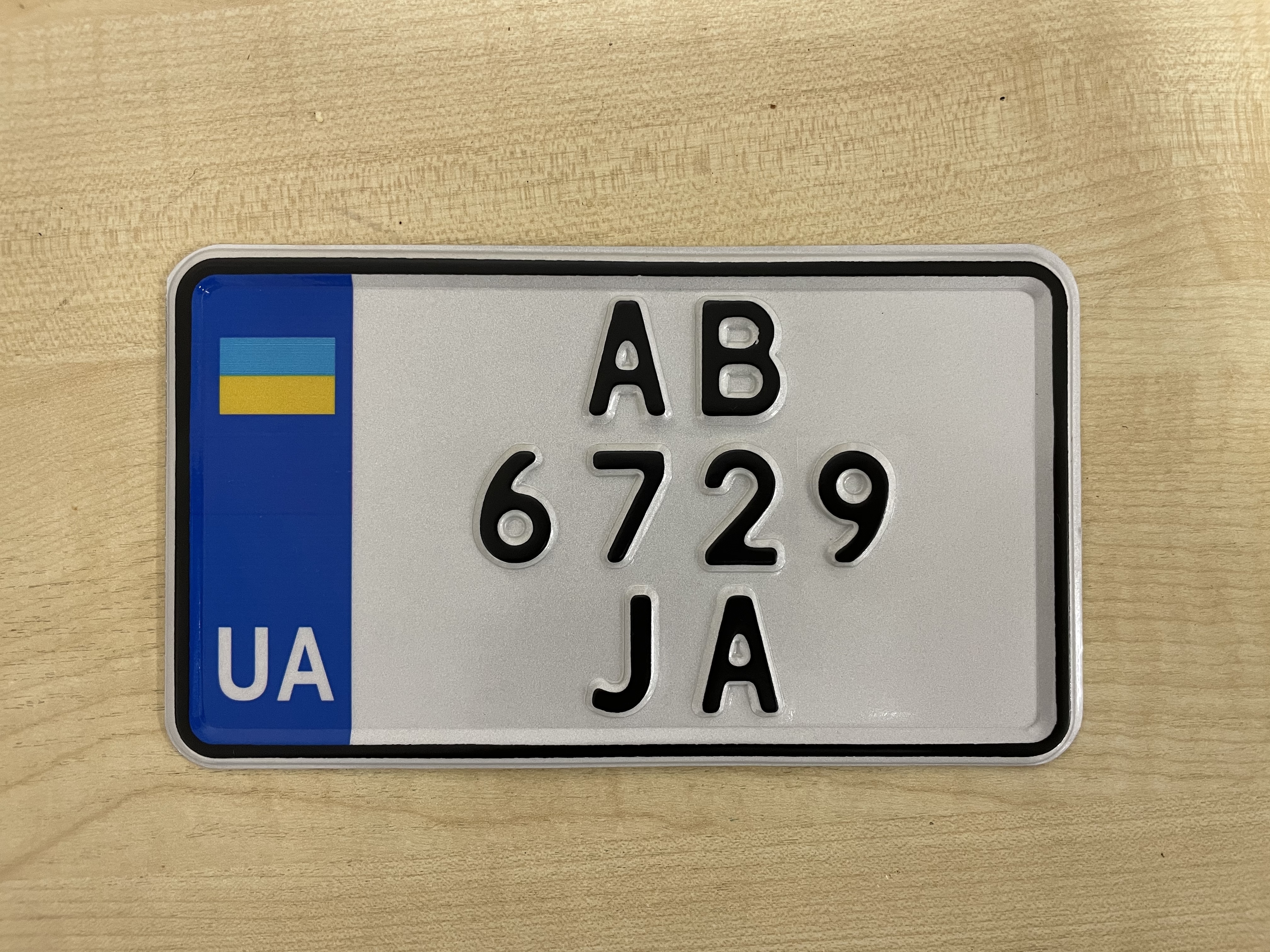 Міні номер на американський мотоцикл, 180х103мм. в три ряди