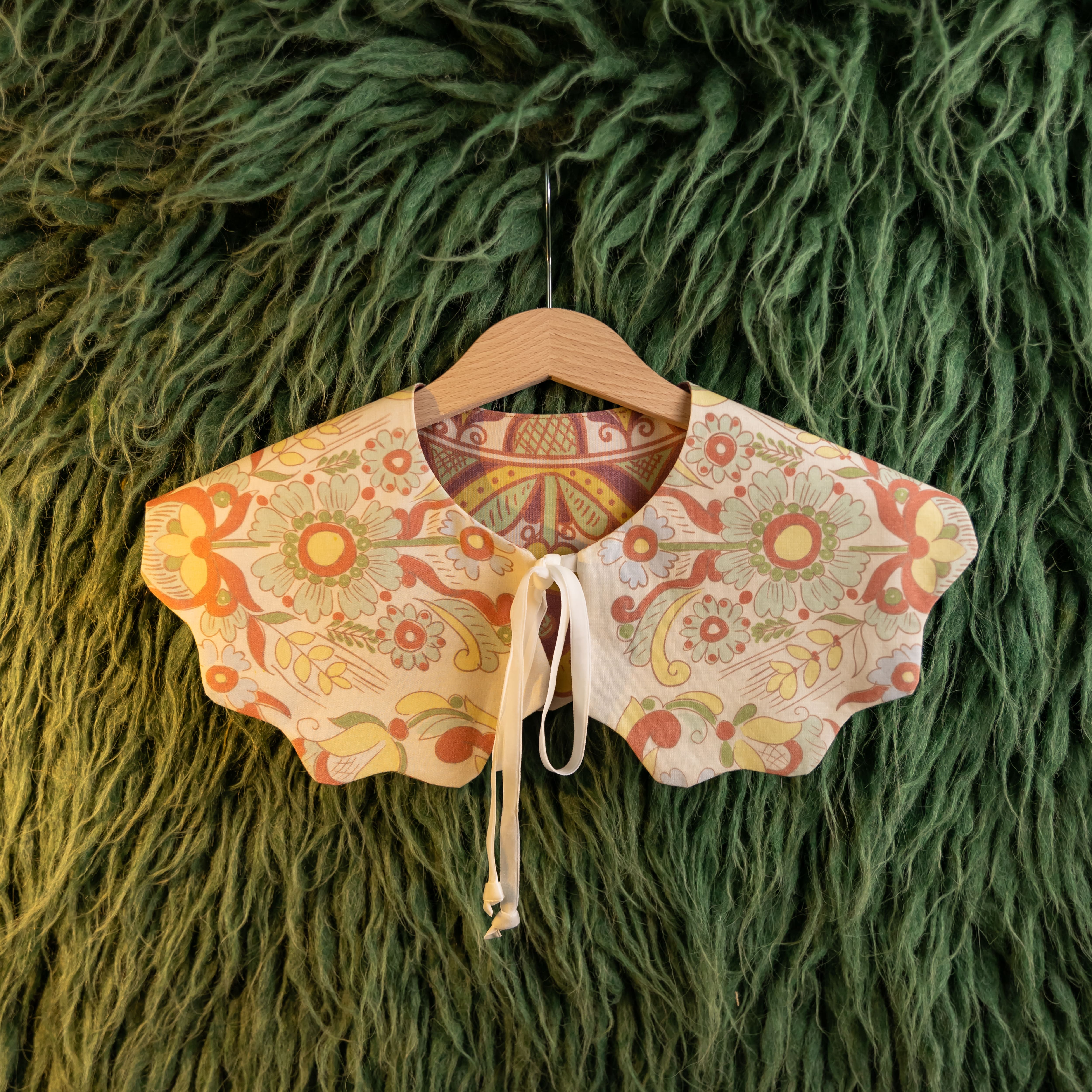 Двохсторонній комірець