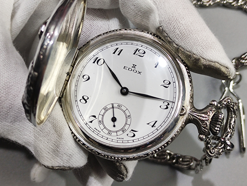 The Edox "Fisherman" is a Swiss mechanical pocket watch.