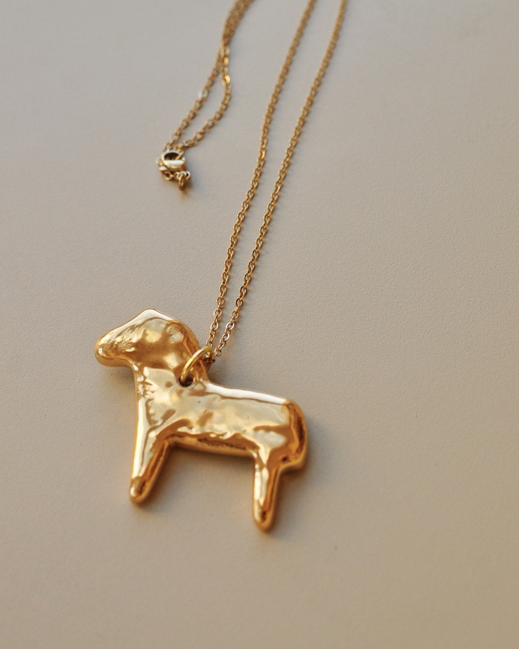 керамічний кулон "коник"