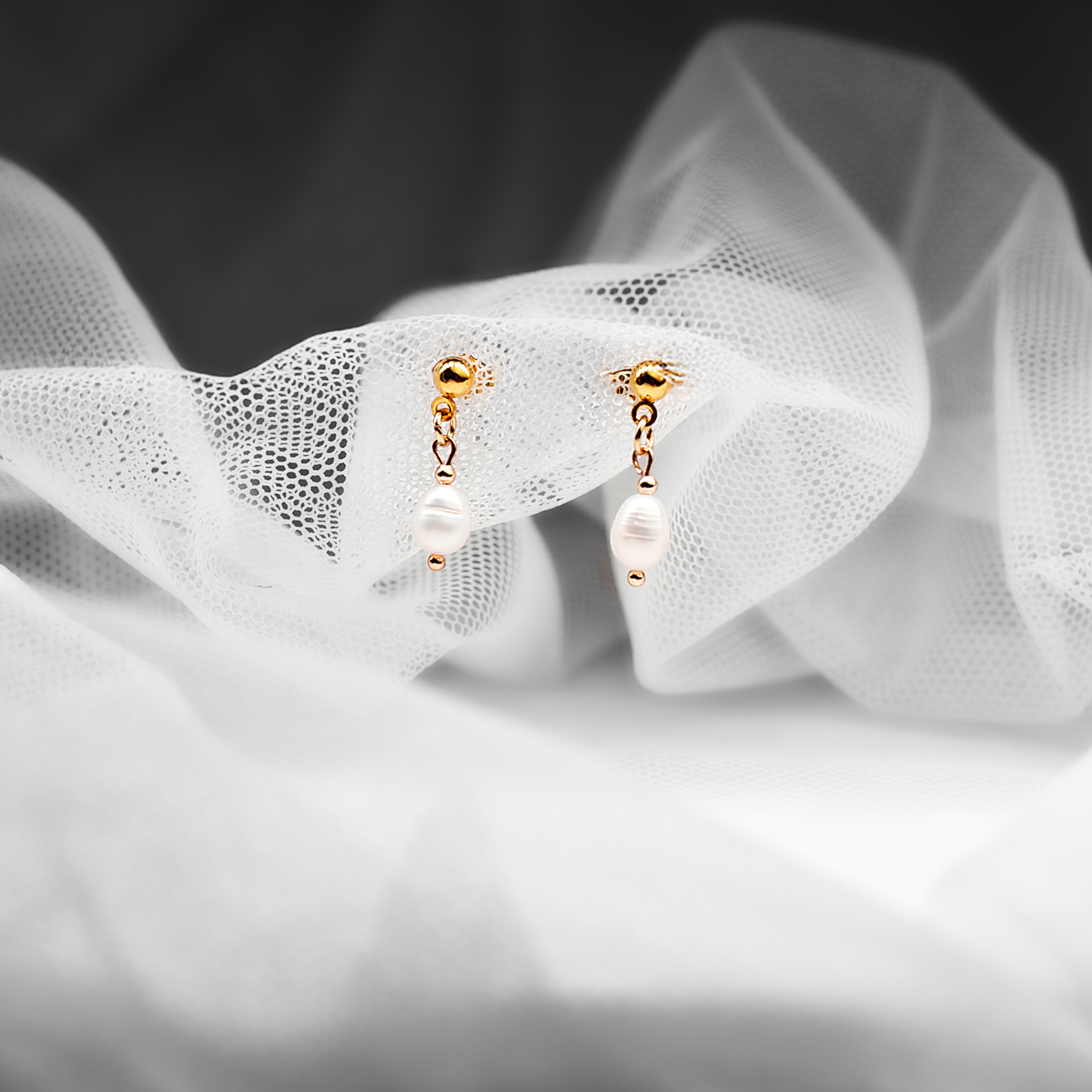 Minimalist Earrings with a Single White Freshwater Pearl