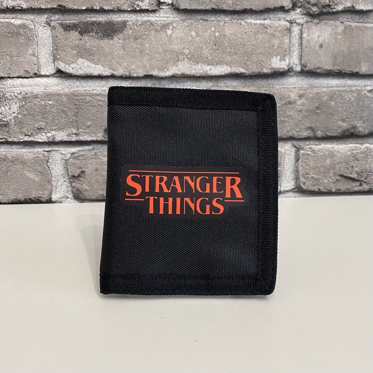 Гаманець Stranger Things чорний — практичний аксесуар для шанувальників серіалу