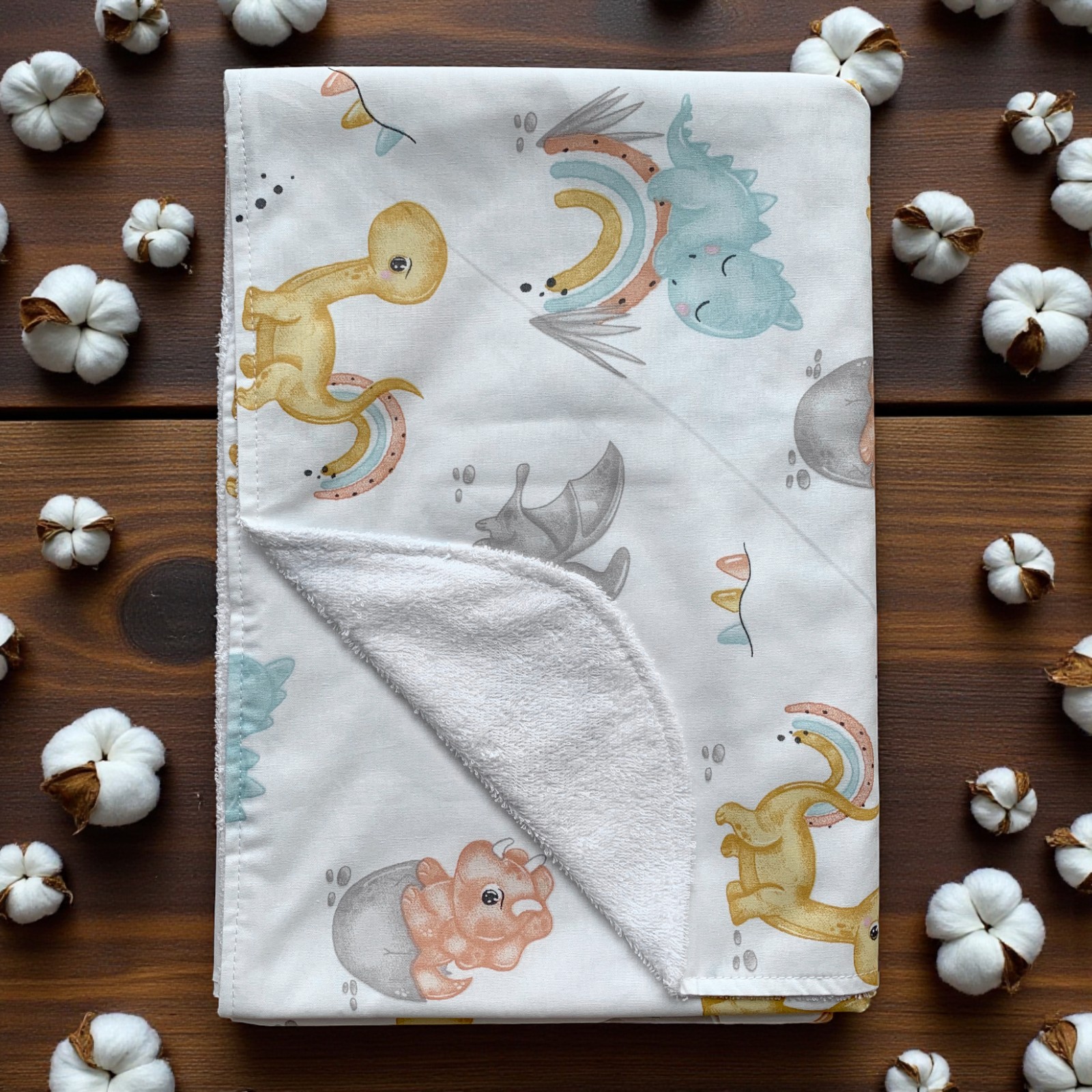 Пелюшка непромокаюча 100 х 70 см Динозаври