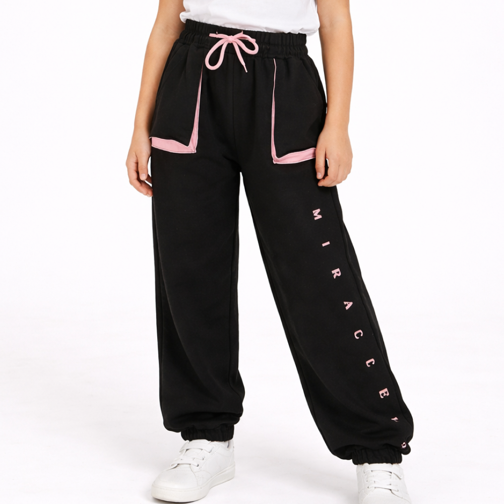 Спортивні штани чорні з рожевими вставками. розміри 104-170 см.