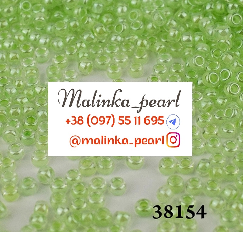 Бісер зелений, кристальний, глазурований з фарбованим отвором