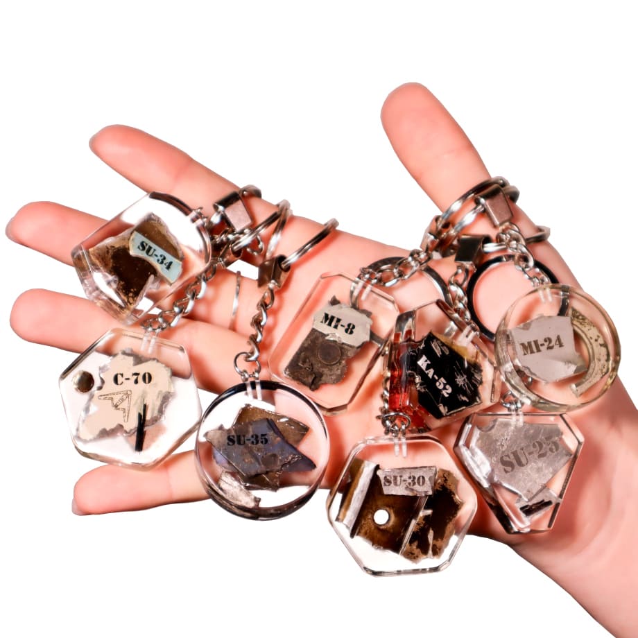 Collection of War Trophies – 8 Keychains Made from Downed Russian Aircraft