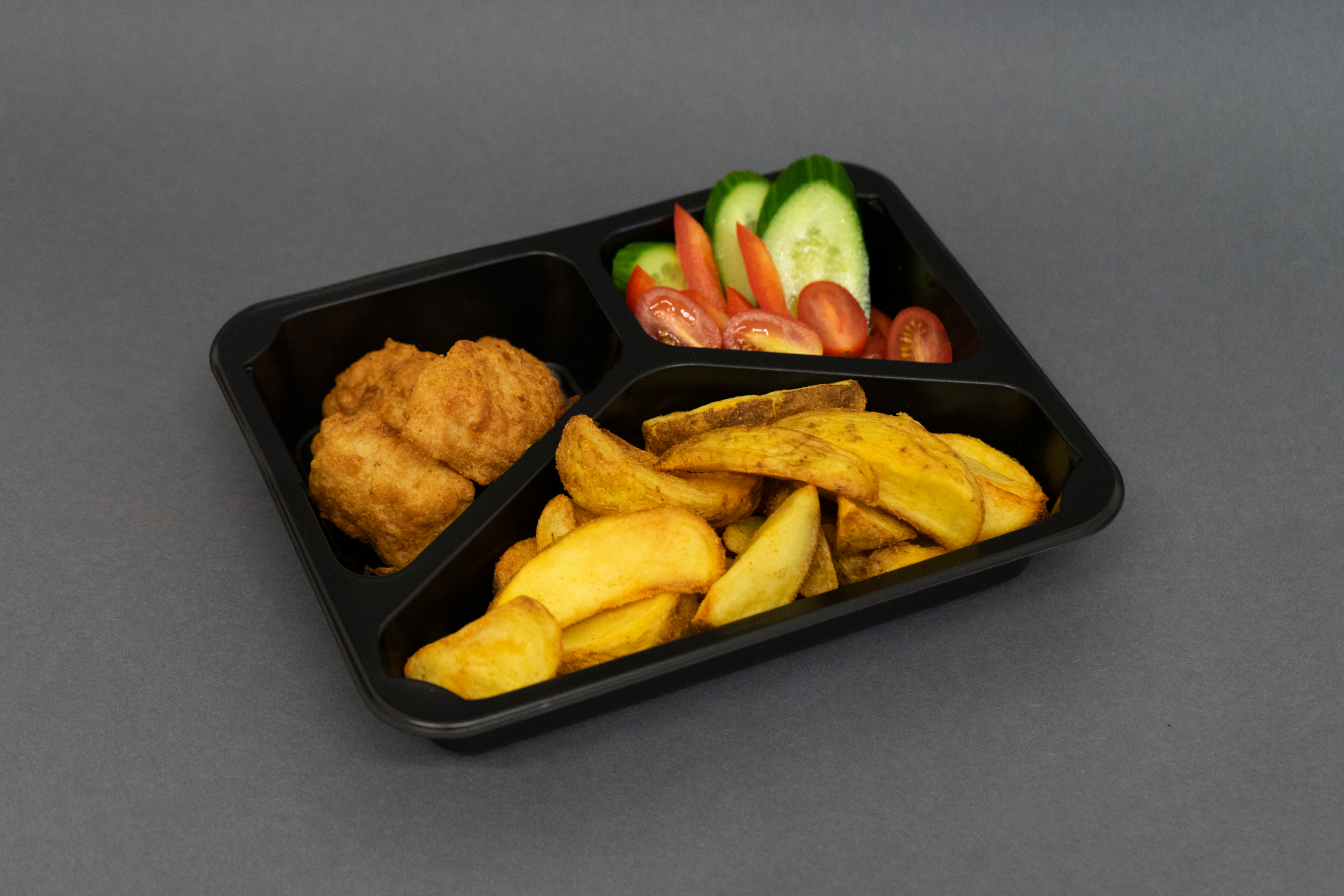 French Fries with Fish Nuggets and Vegetables