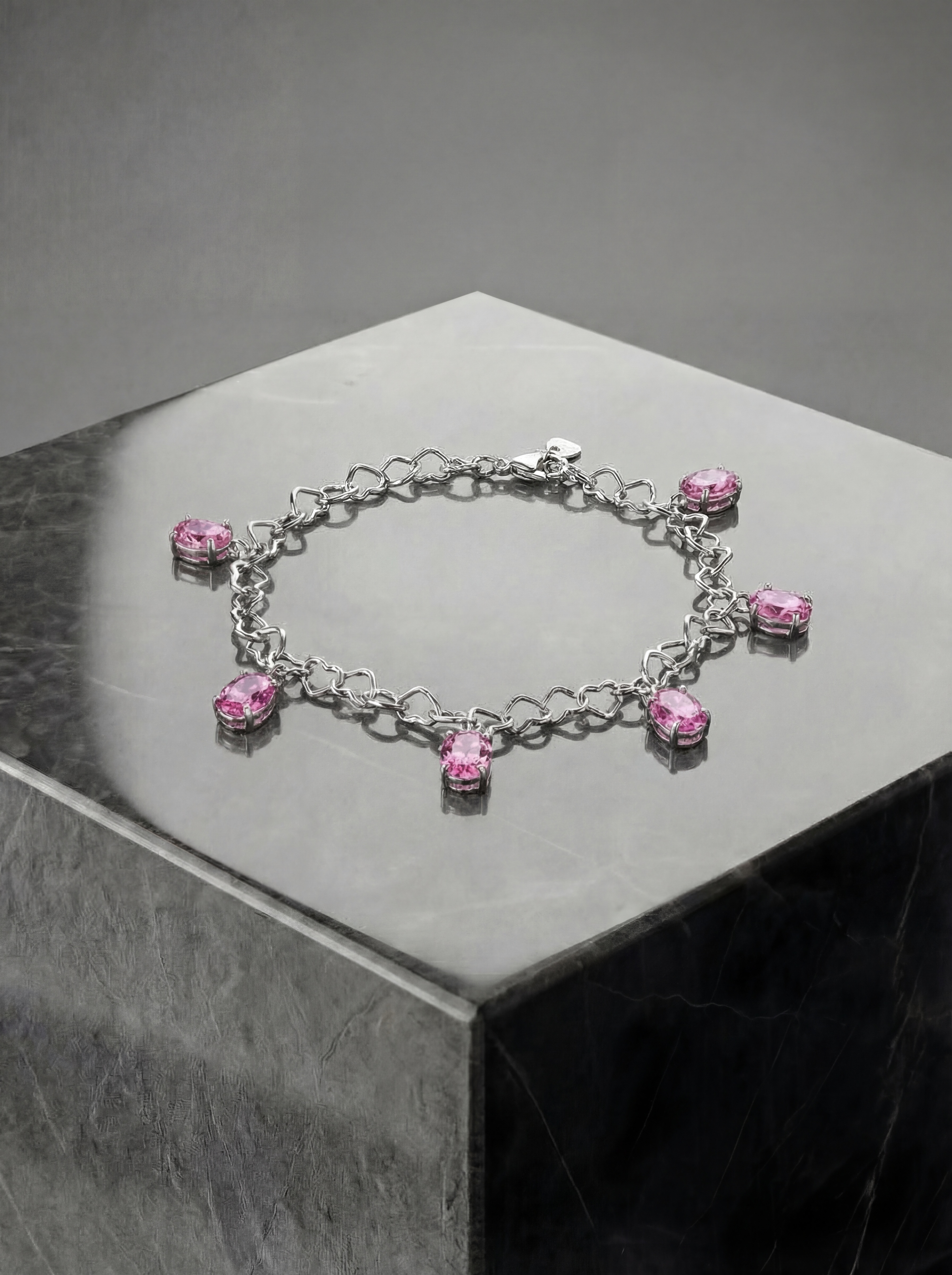 Браслет серденьки з рожевими овальними  фіанітами