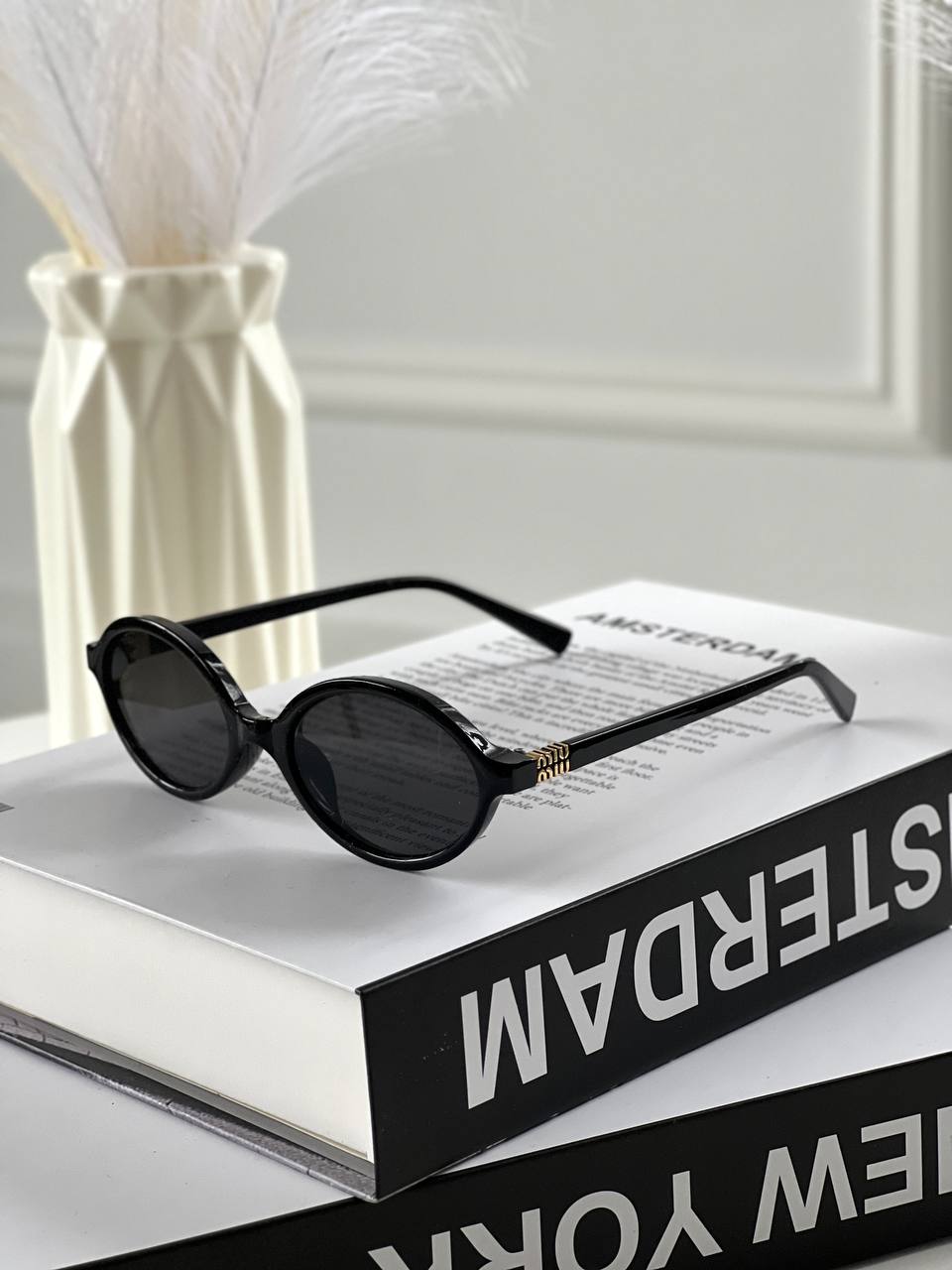 Женские очки MIU MIU – воплощение элегантности и утонченного стиля