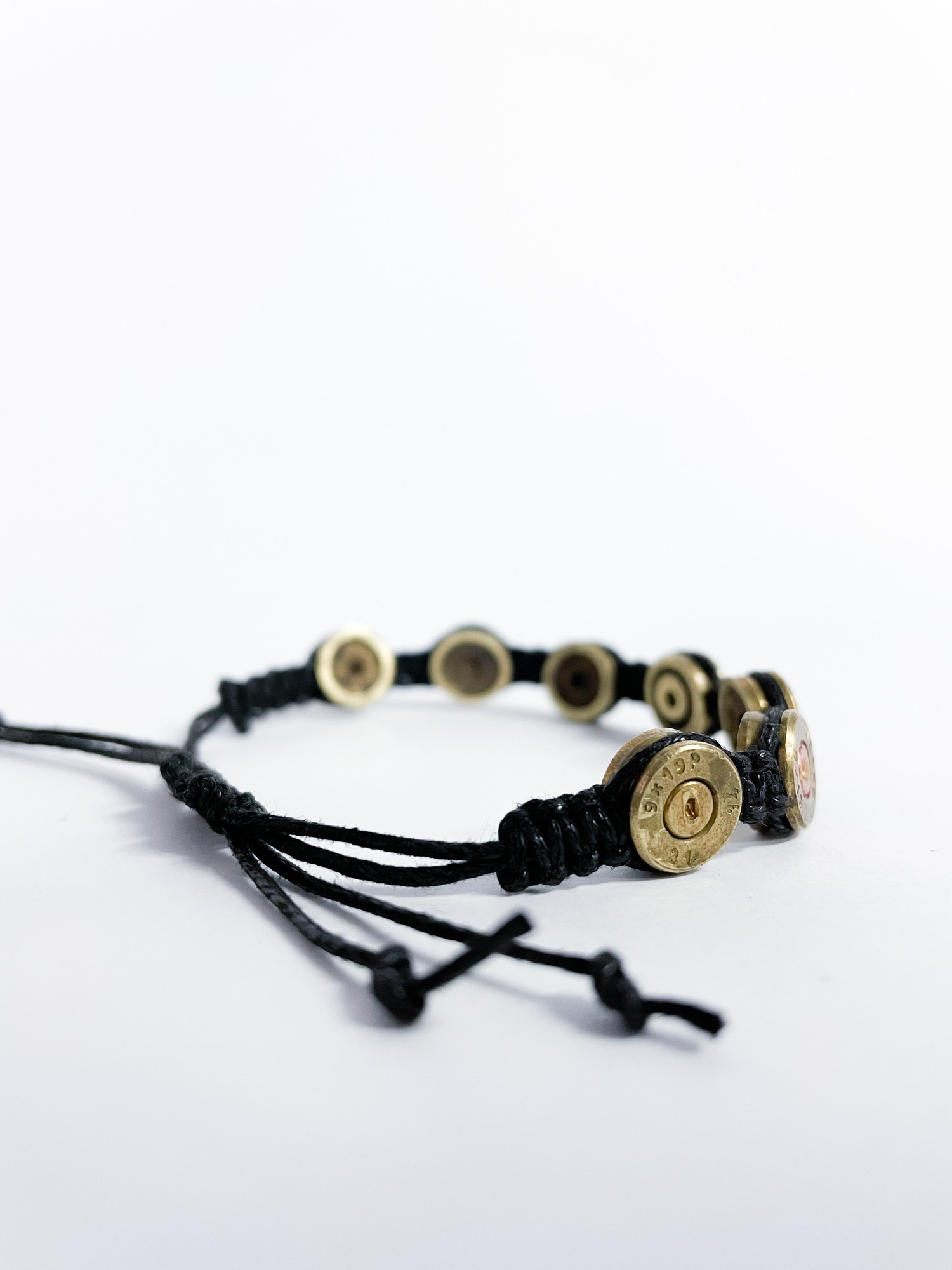 The bracelet is made of spent shell casings