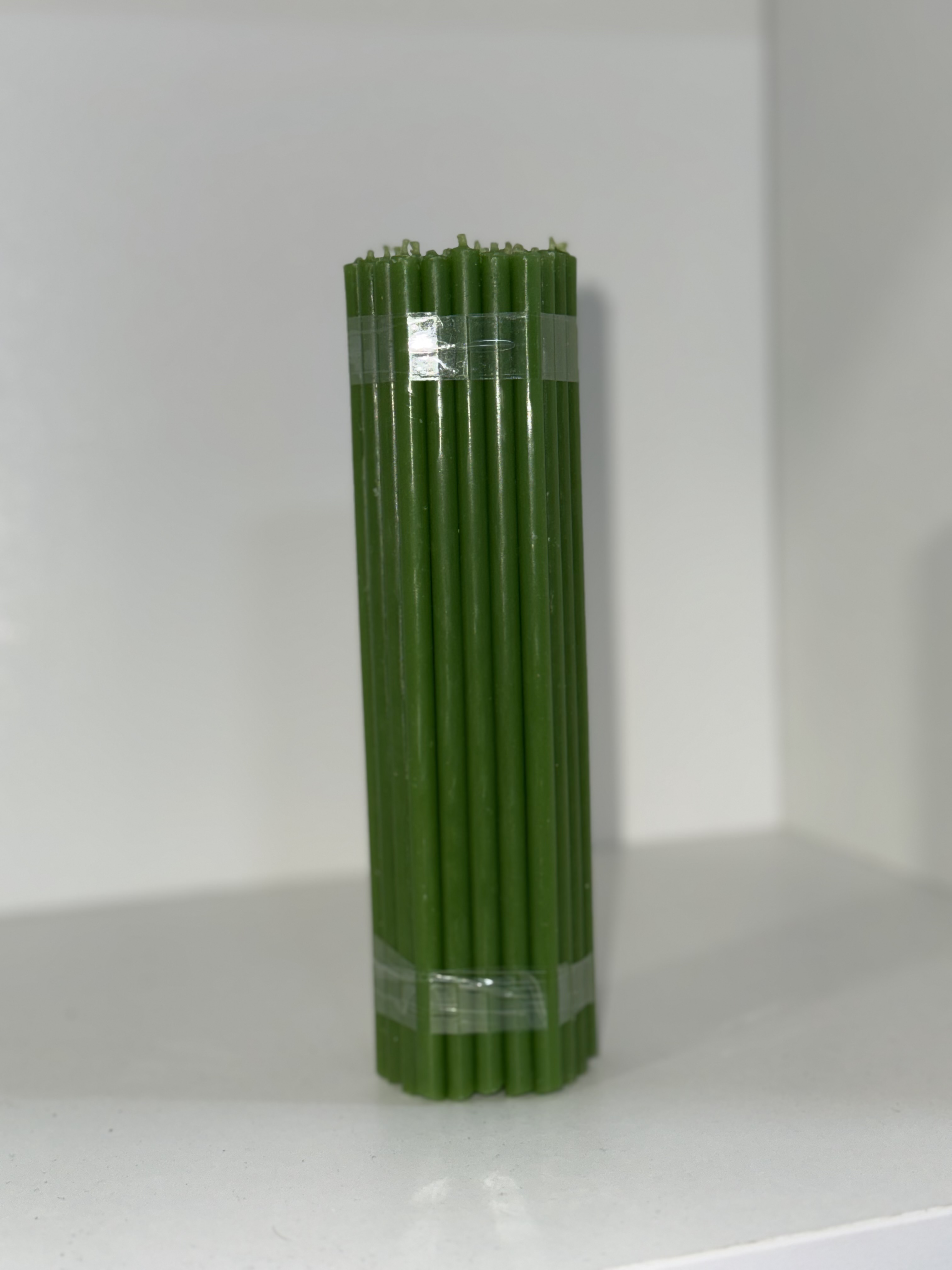 Воскові свічки 16 см зелені