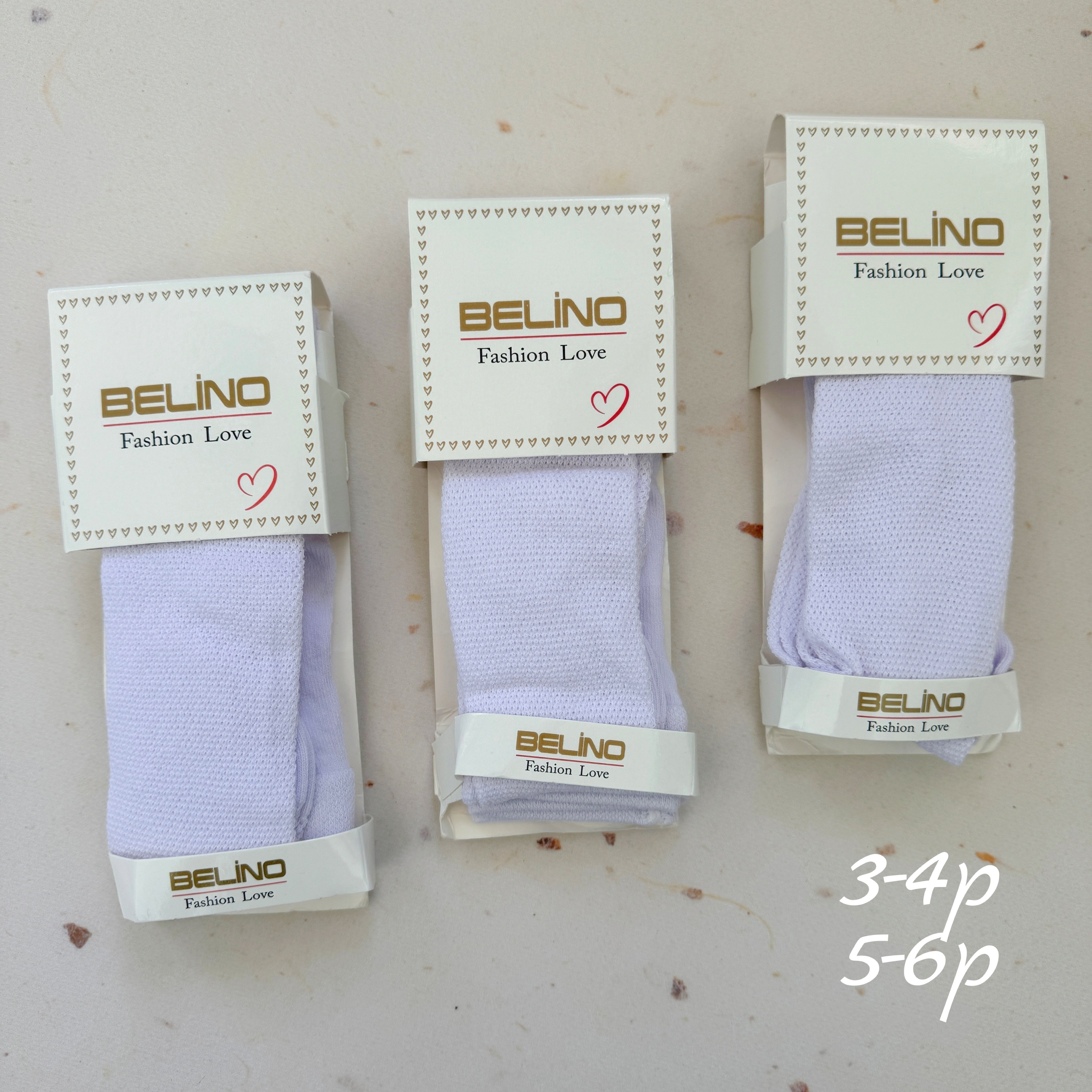 Дитячі ажурні демісезонні колготи у білому кольорі