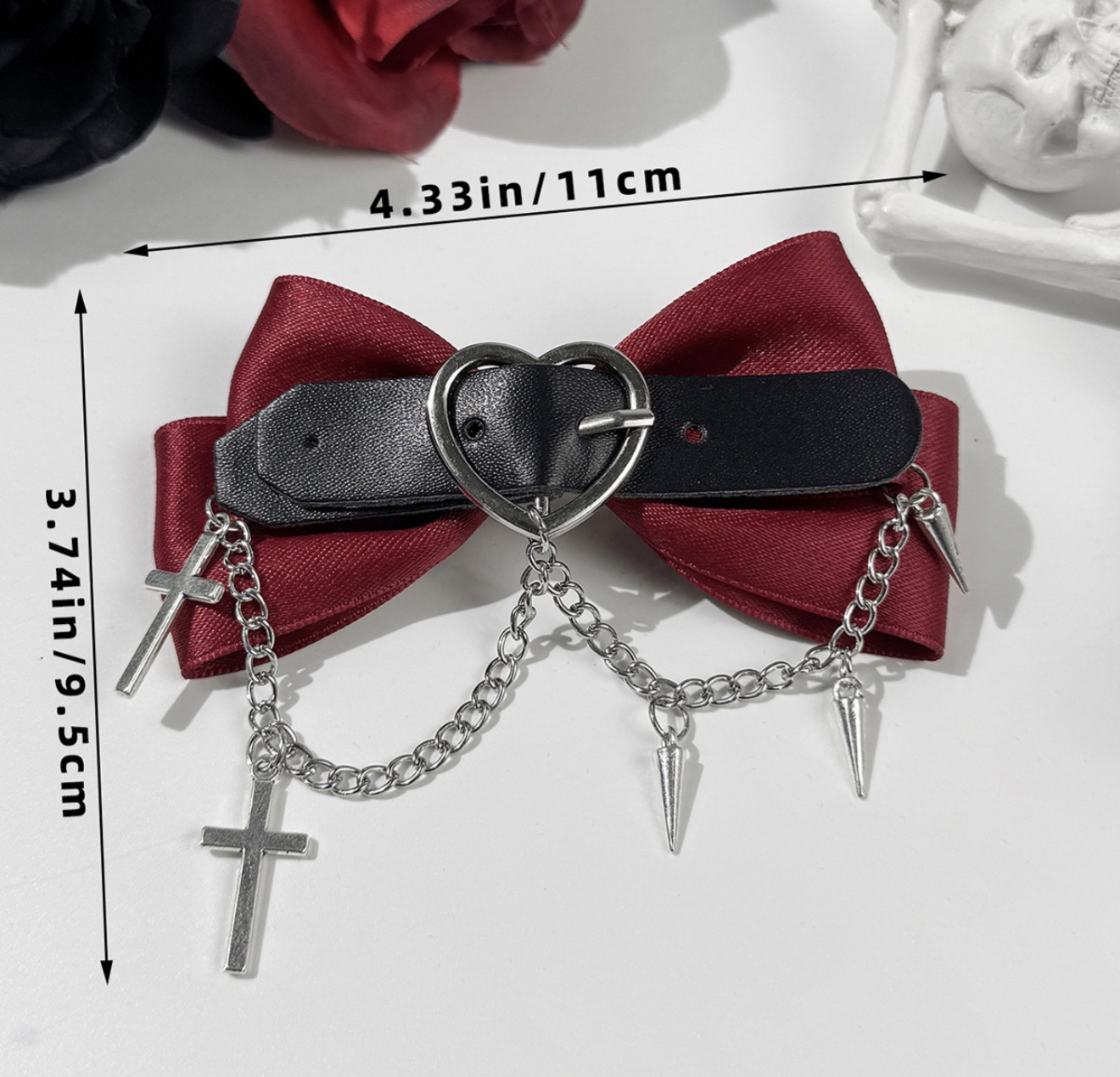 Стильна заколка бант з шипами і хрестиками червона