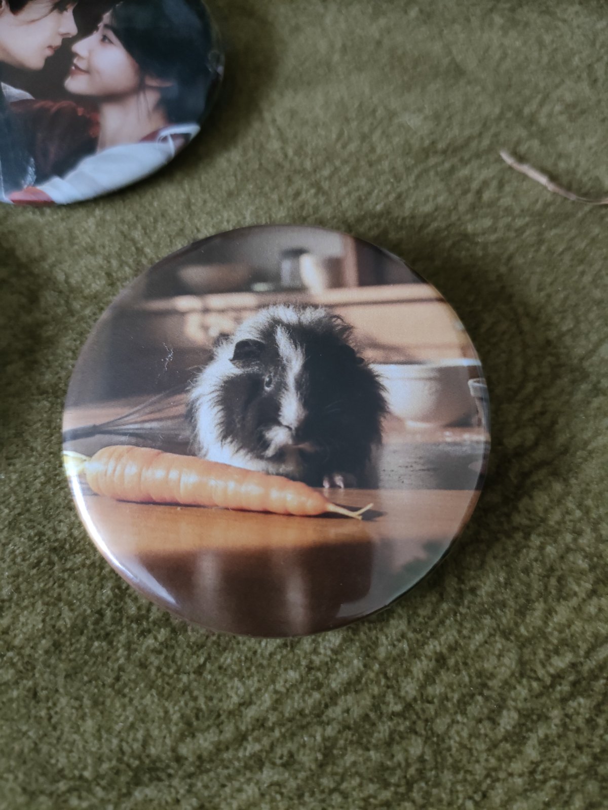 Значок з мурчаками