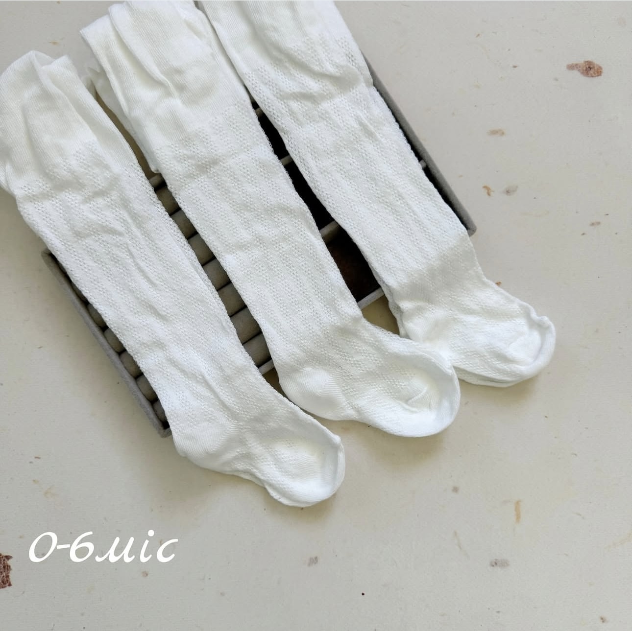 Дитячі ажурні колготи у молочному кольорі для новонароджених