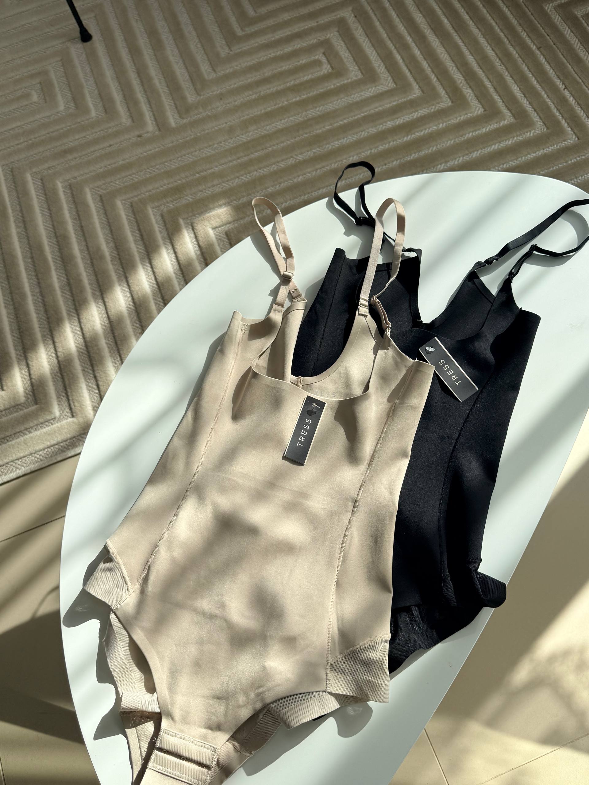 БОДІ ПІД ГРУДИ