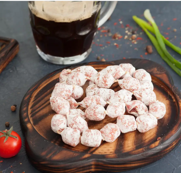 Ковбаски Коктейльні (ціна за 100 грам)