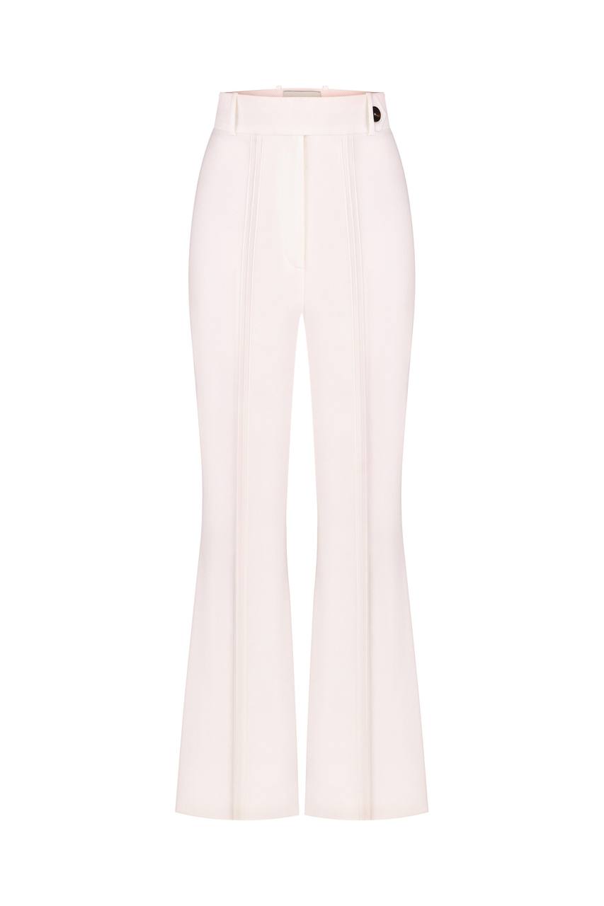Flared trousers with an accent on the back