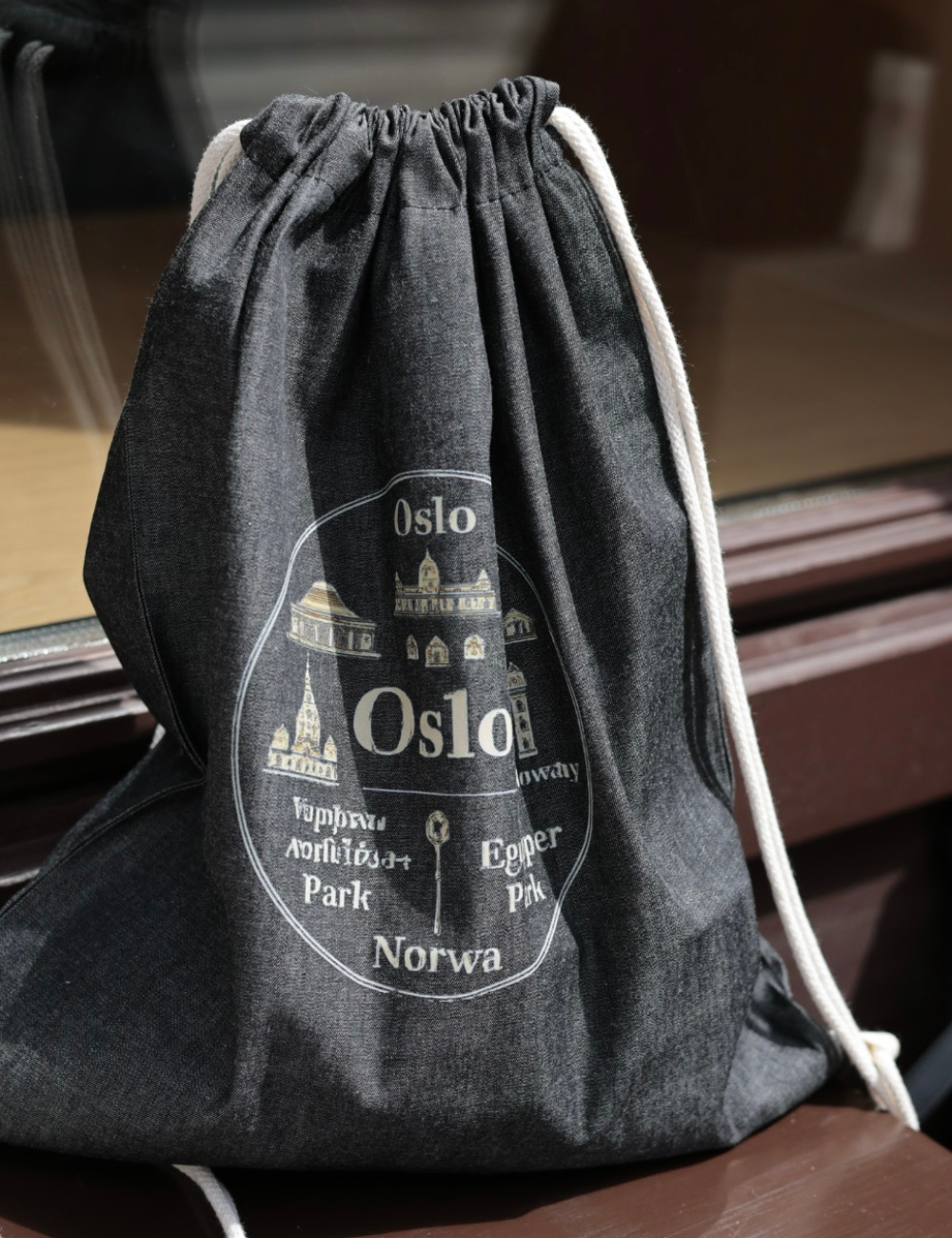 Denim backpack with Oslo print
