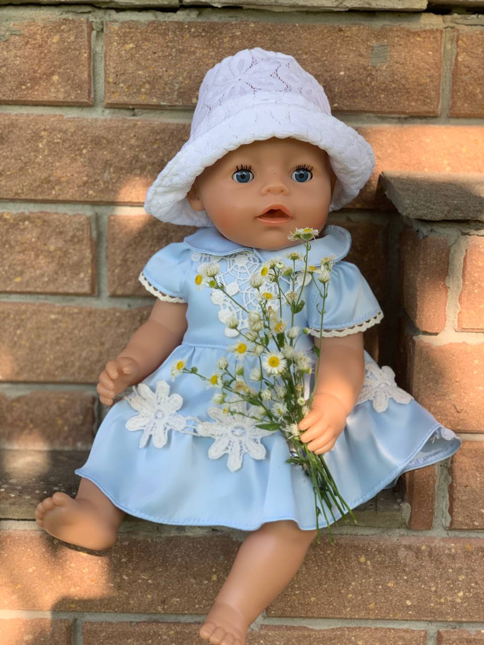 Блакитна сукня з мереживним оздобленням для ляльки Baby Born