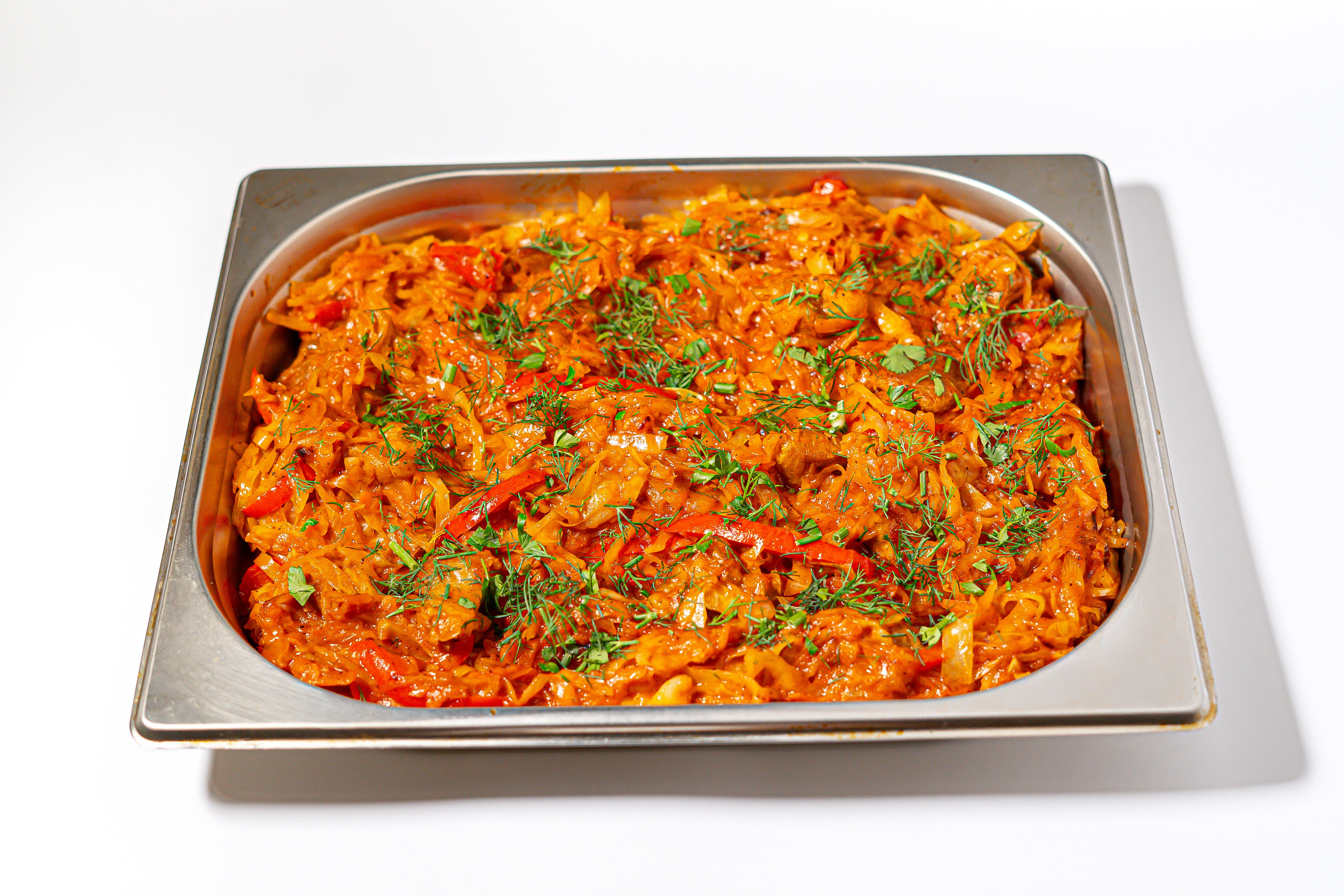 Капуста тушена зі свининою