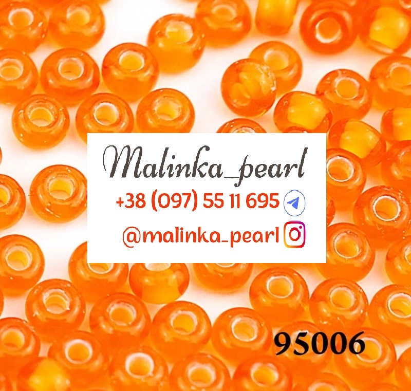 Бісер жовтогарячий, прозорий, з білим крейдяним отвором