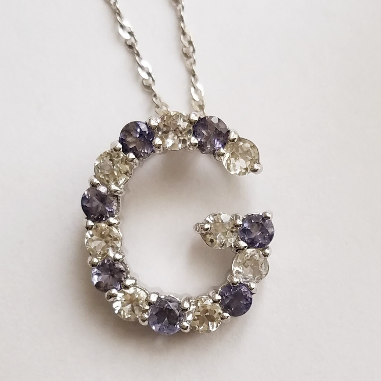 Tanzanite and Topaz "G" Necklace