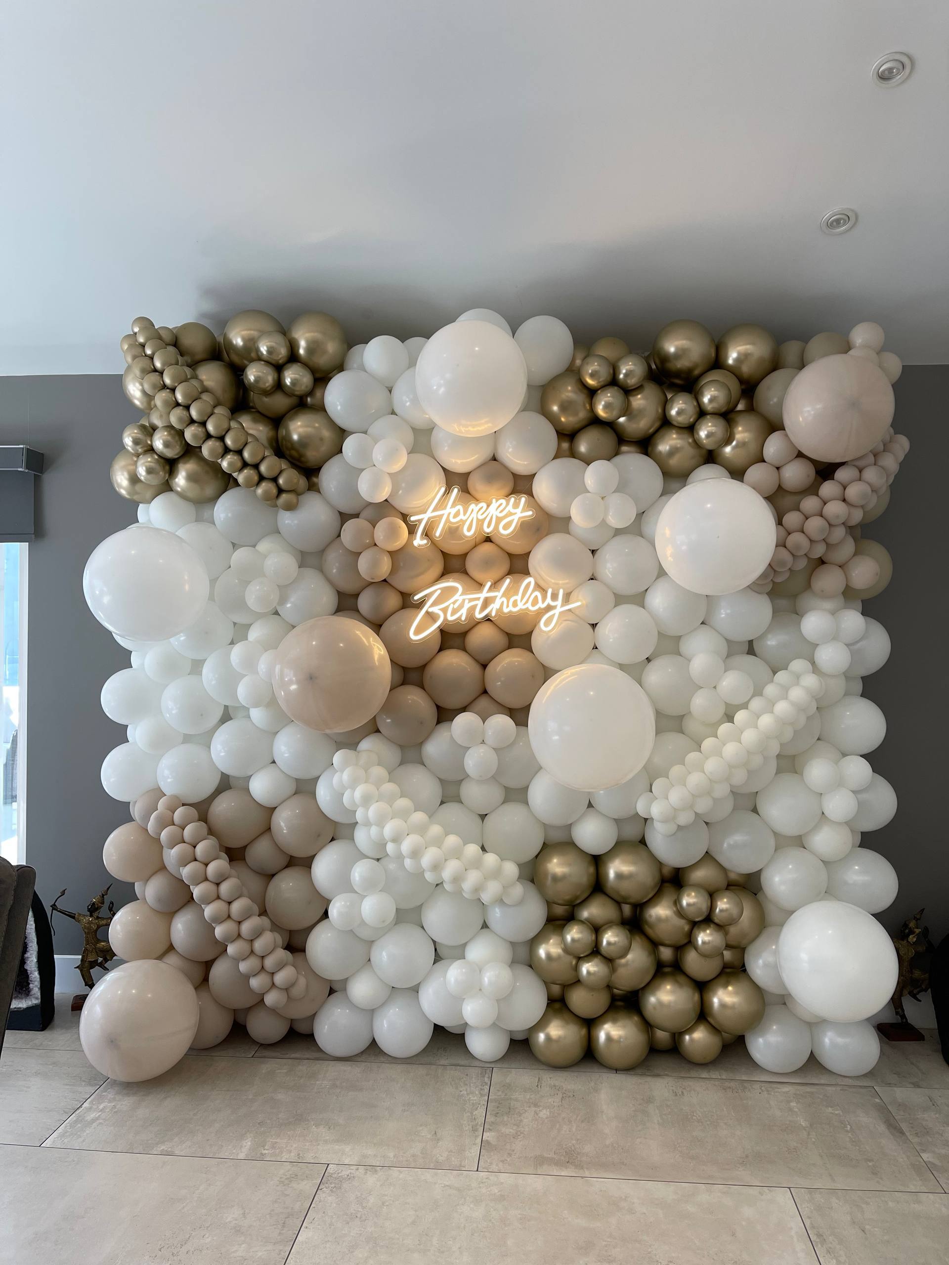 Elegant Balloon Wall with Happy Birthday Neon Sign