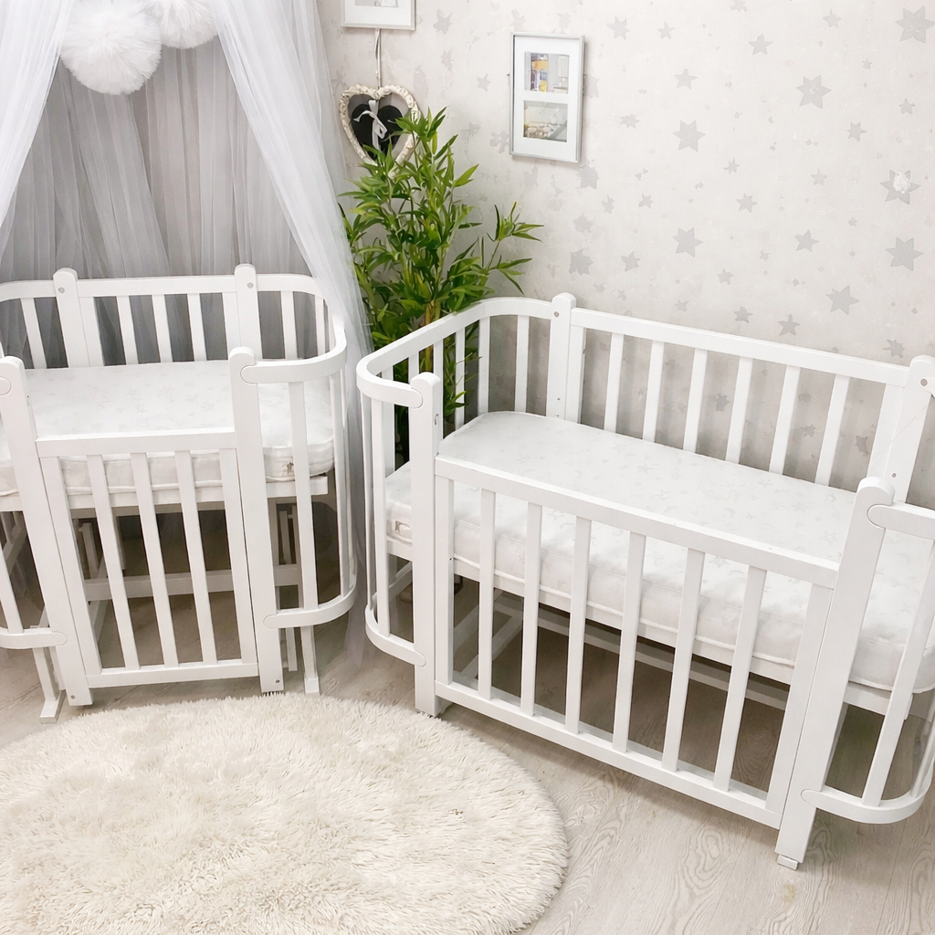 Ліжечко Престиж трансформер з матрасами, маятником та колесами біле