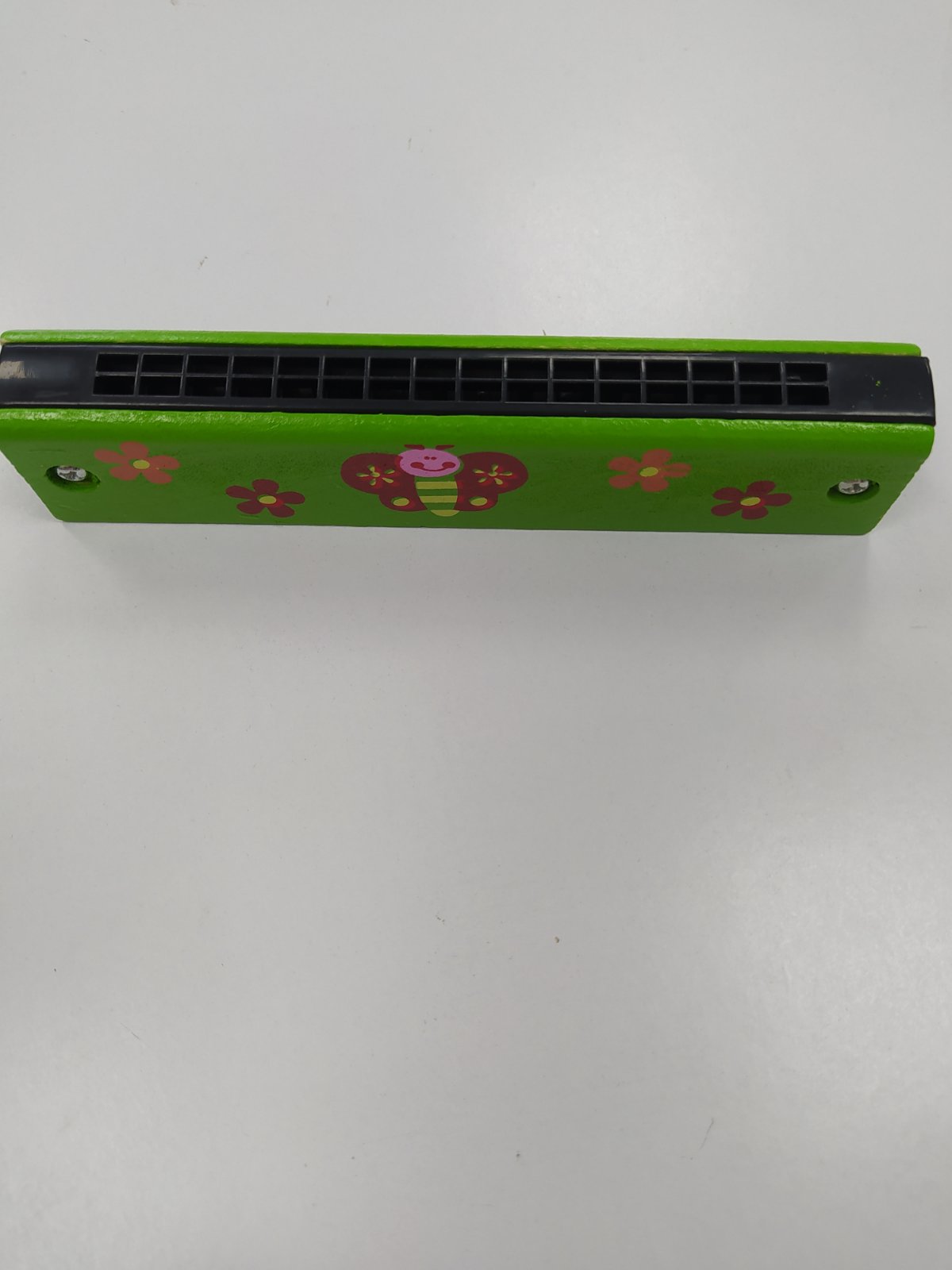 Дитячий музичний інструмент – Губна гармошка.