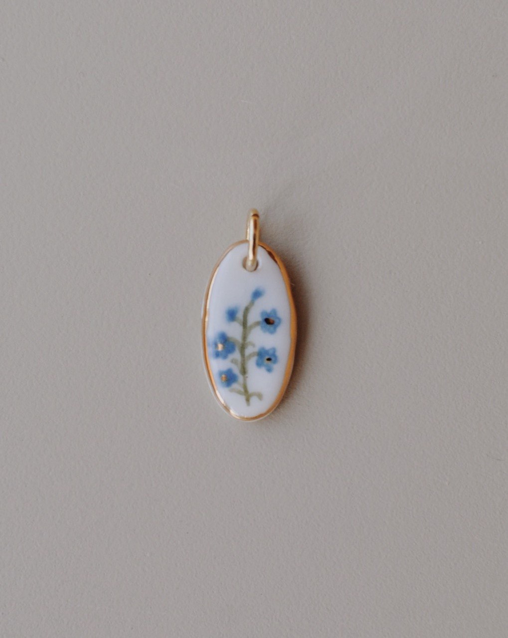порцеляновий кулон "незабудки"