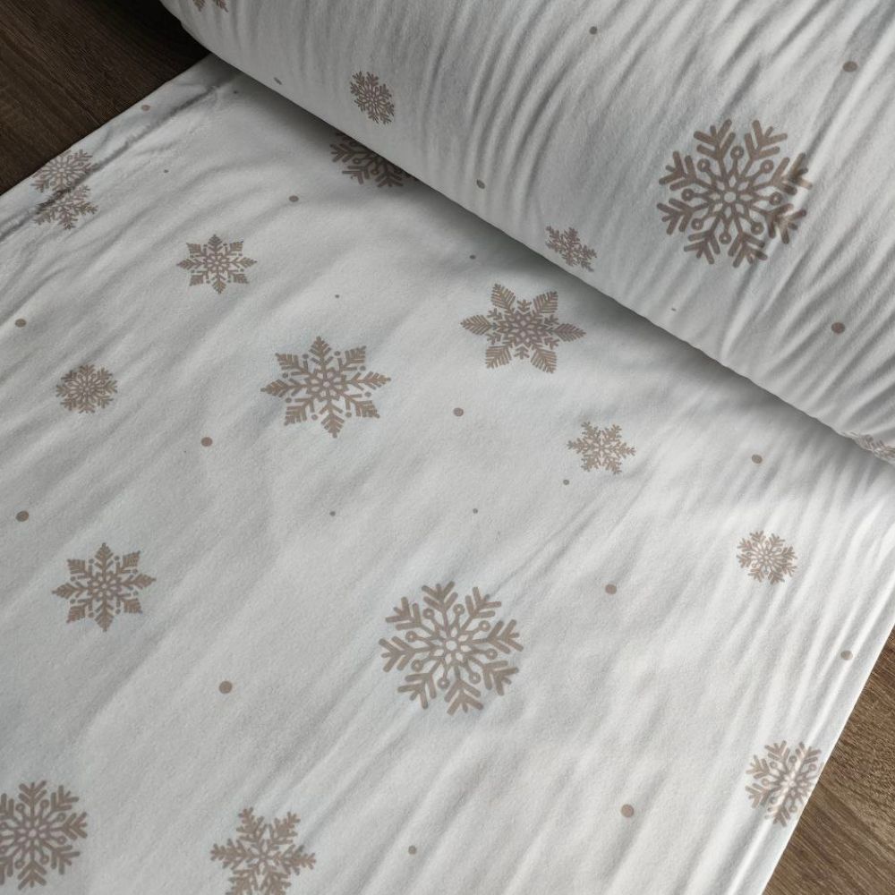 Тканина фланель-Сніжинка бежева на білому