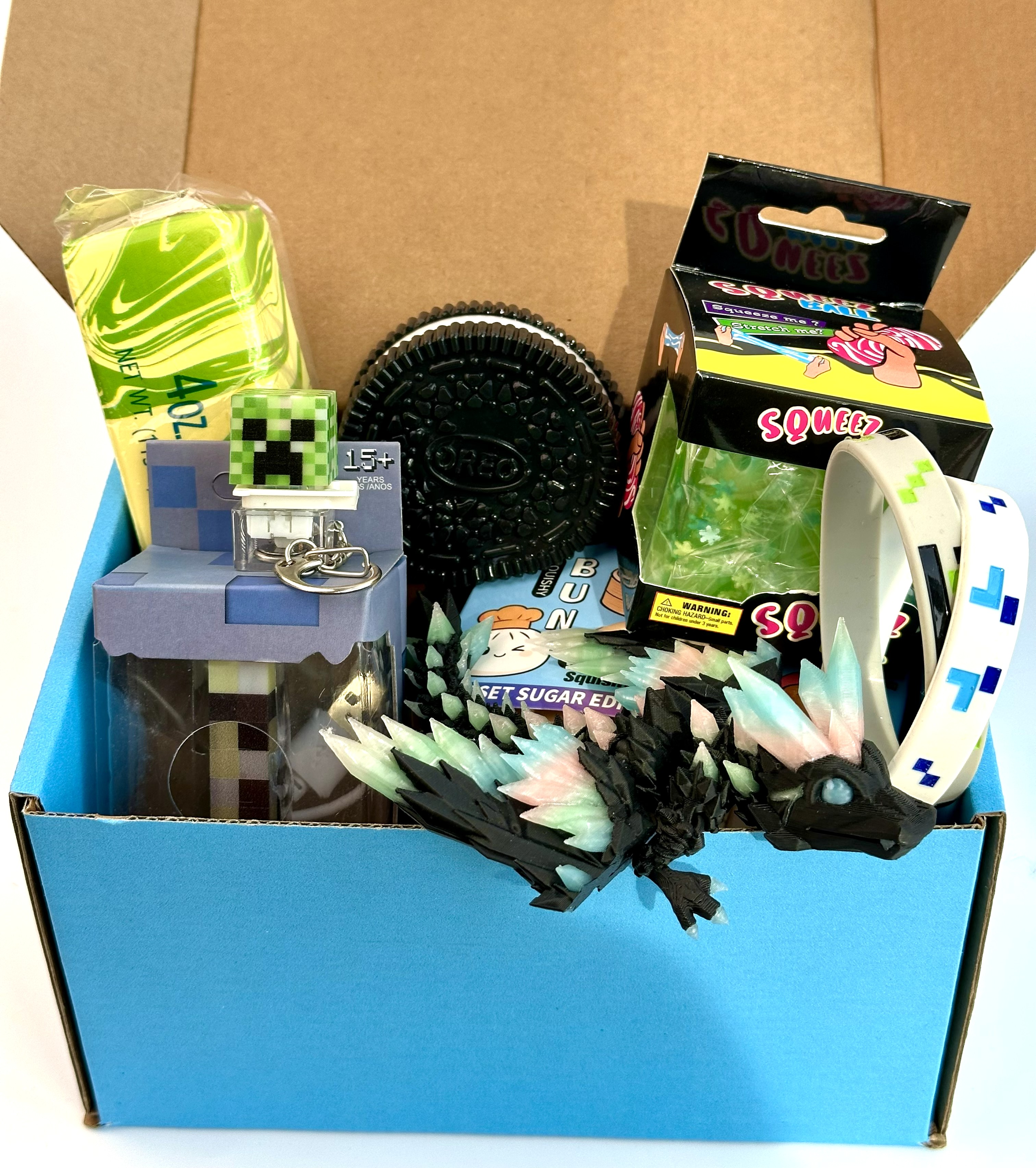 Подарунковий набір Trendy Box: Сквіш Орео та хінкалі, сквіш масло, 3Д дракон, ліхтарик та кейкап Майнкрафт, 8 од