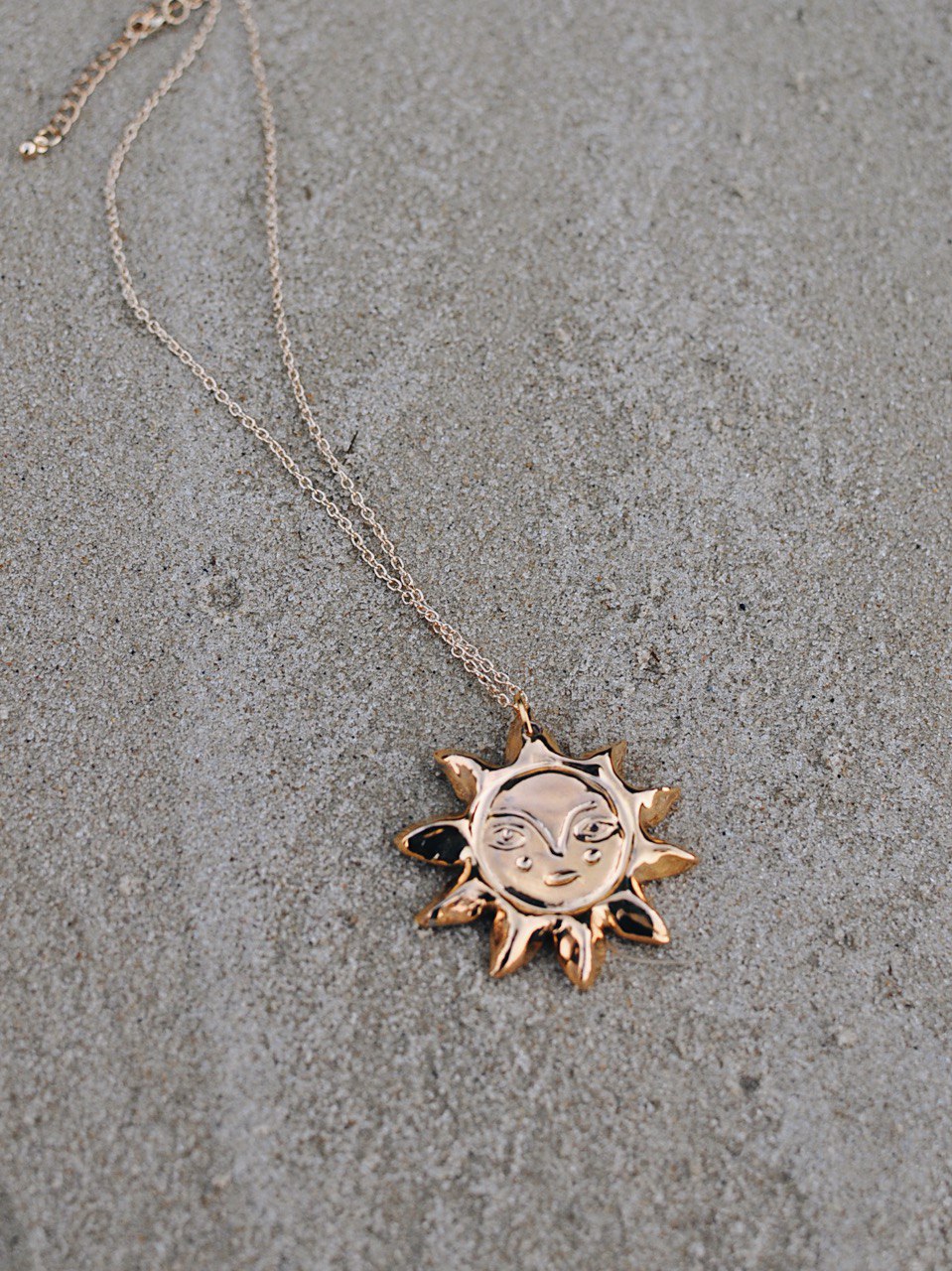 керамічний кулон сонце