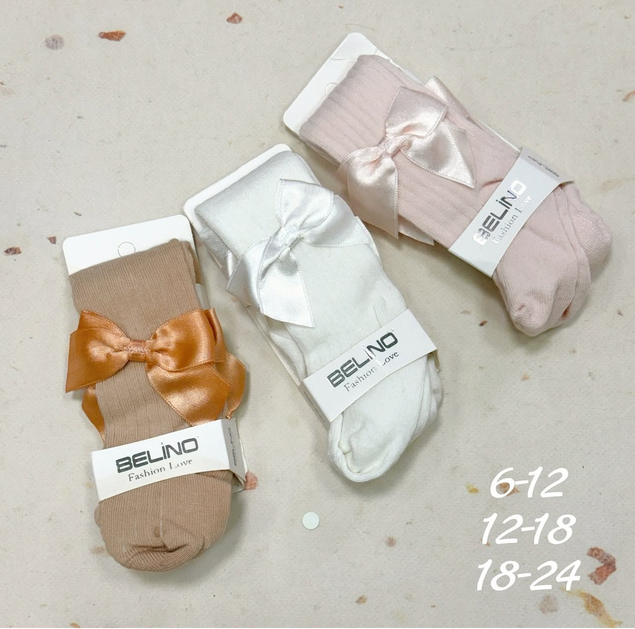 Дитячі демісезонні колготи з бантиком