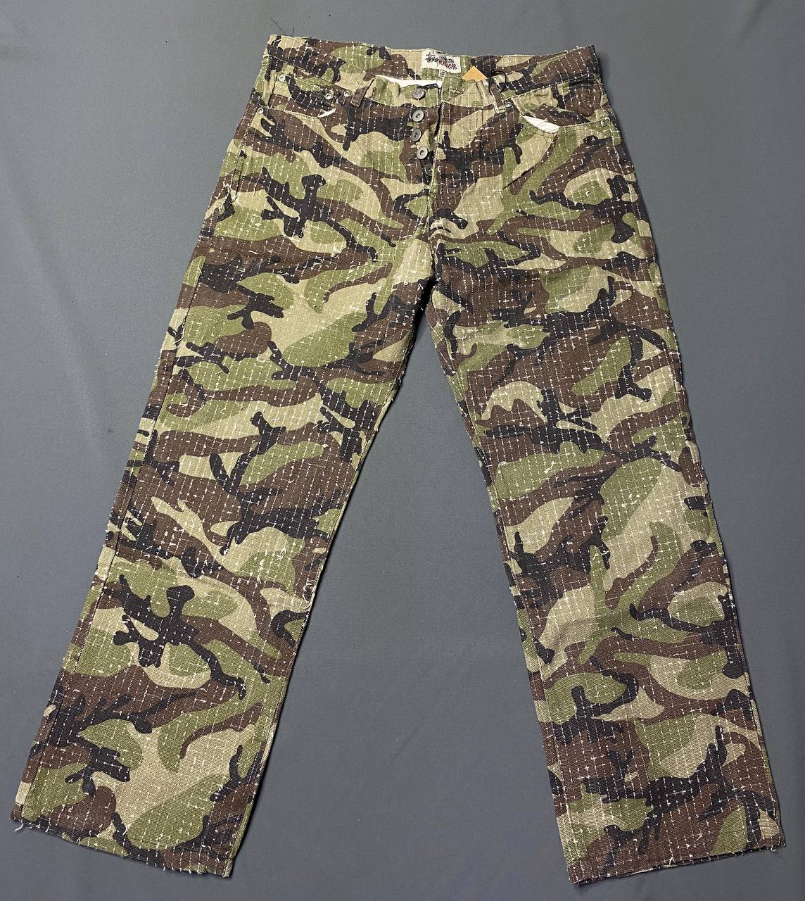 Джинсы камуфляж Stussy