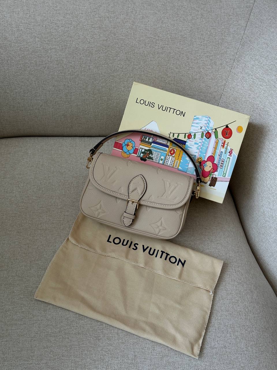 LV Louis Vuitton Diane Monogram Empreinte Leather Beige