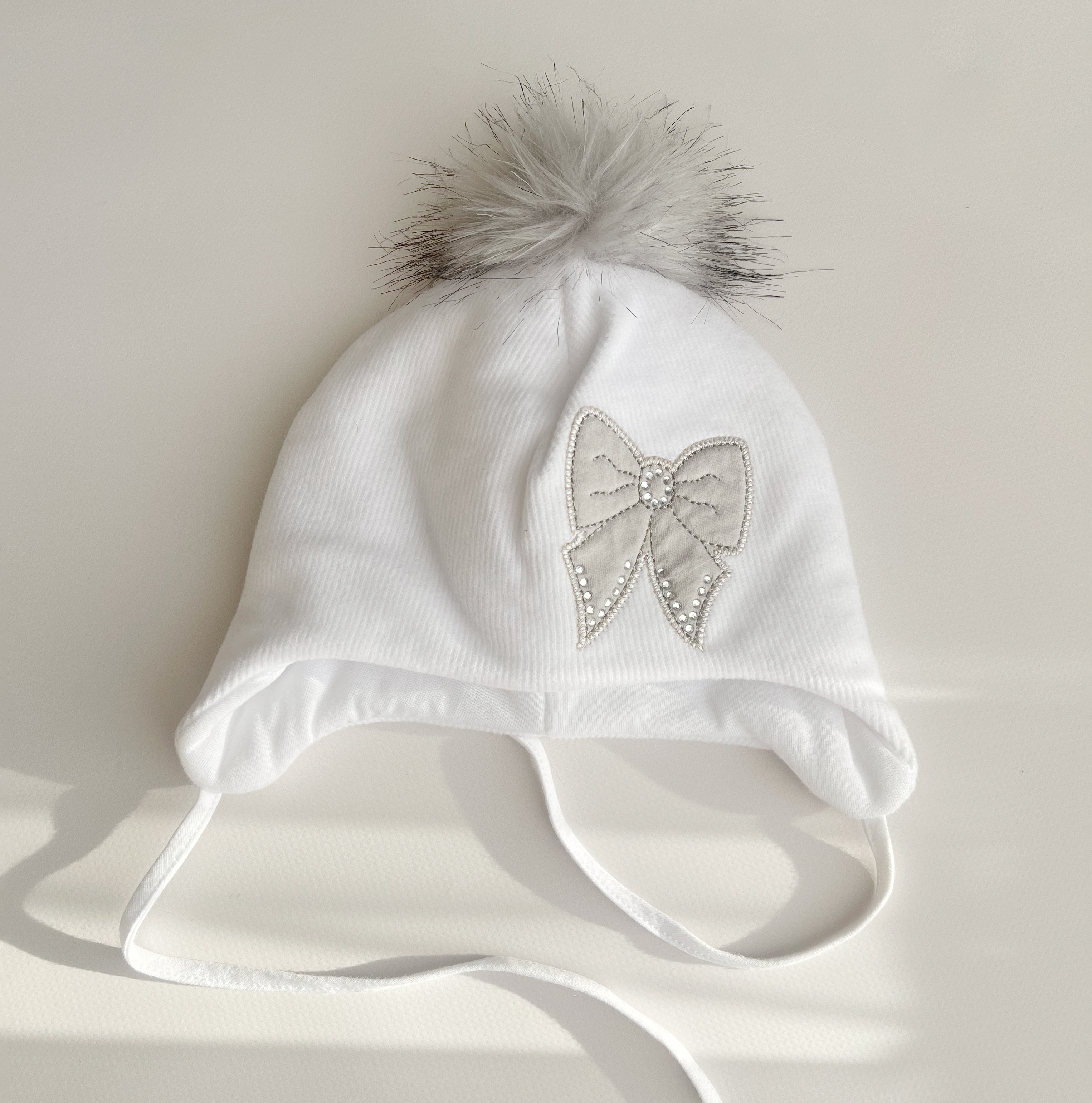 Шапка з помпоном 