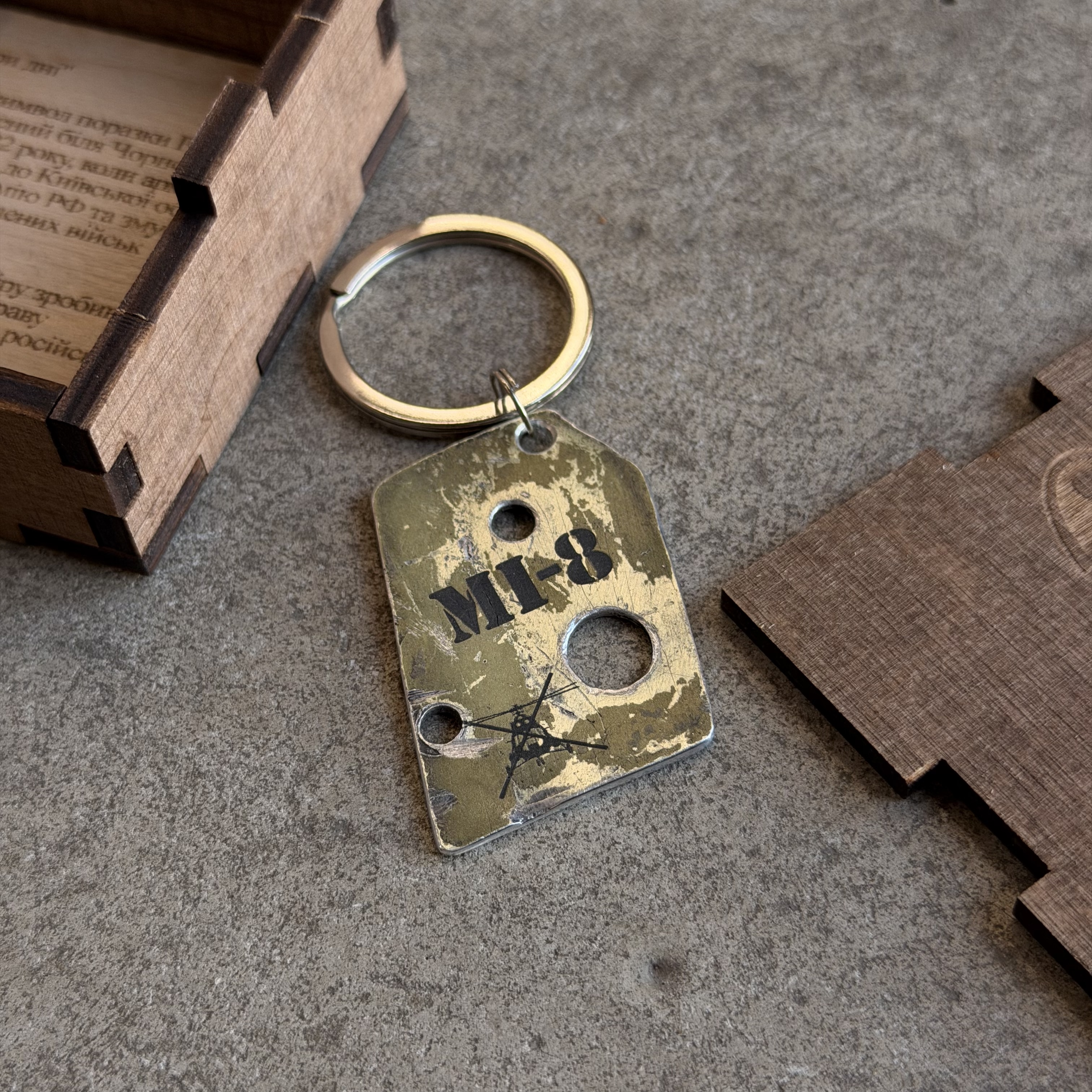 Metal keychain of an enemy Mi-8 helicopter