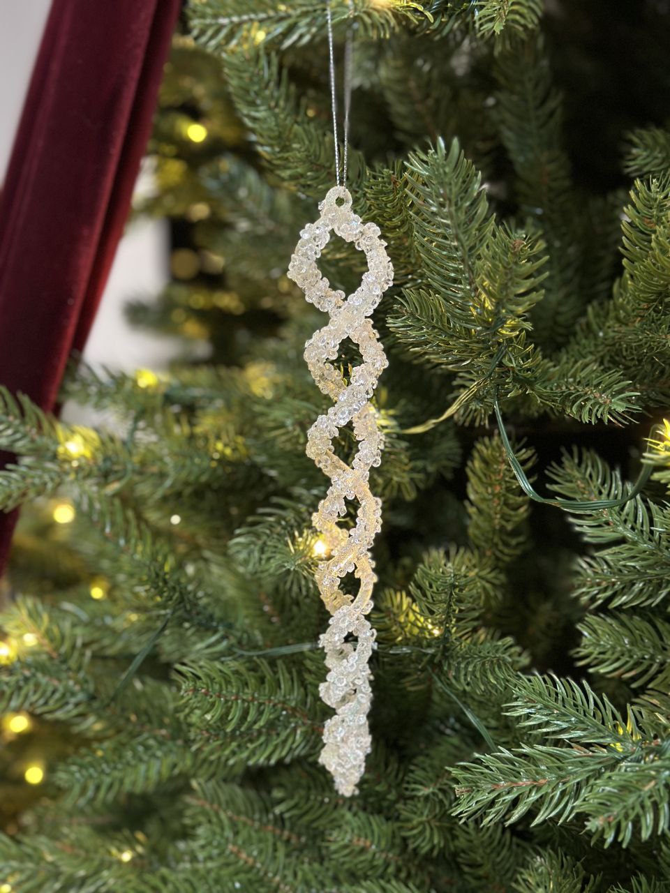 Ялинкова прикраса крученої форми, ніжно-рожева