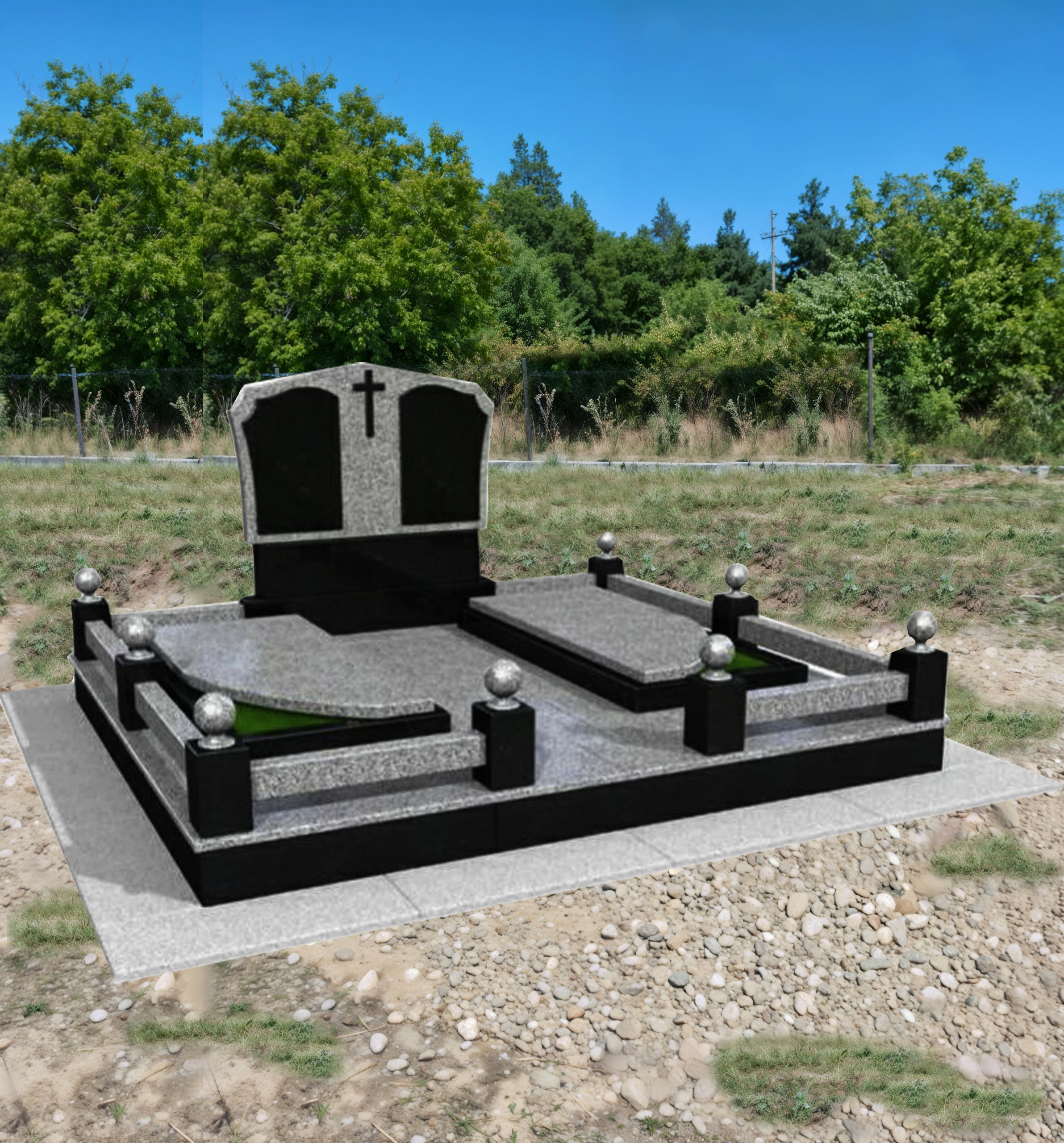 Гранитний пам'ятник на двох з огорожею